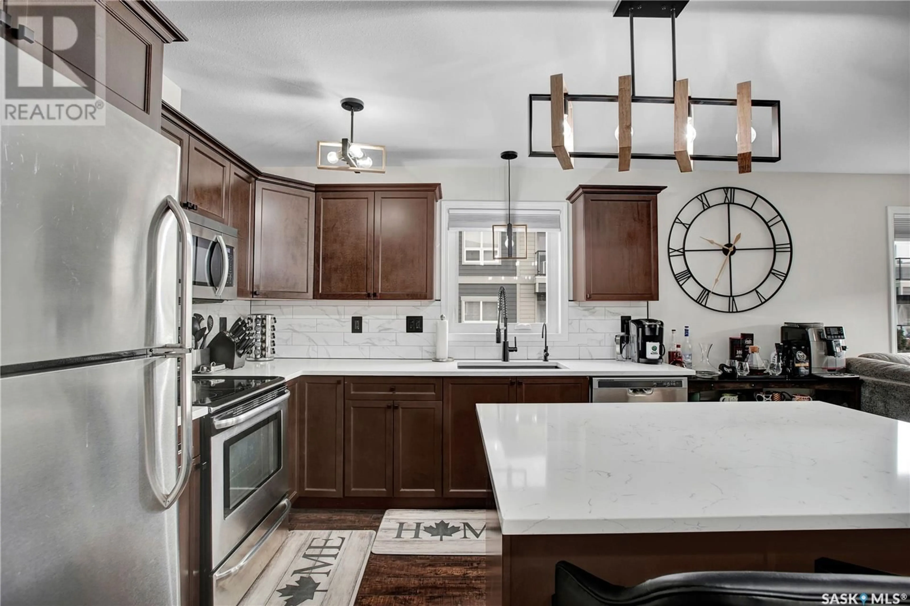Open concept kitchen, ceramic/tile floor for 5212 110 WILLIS CRESCENT, Saskatoon Saskatchewan S7T0N5
