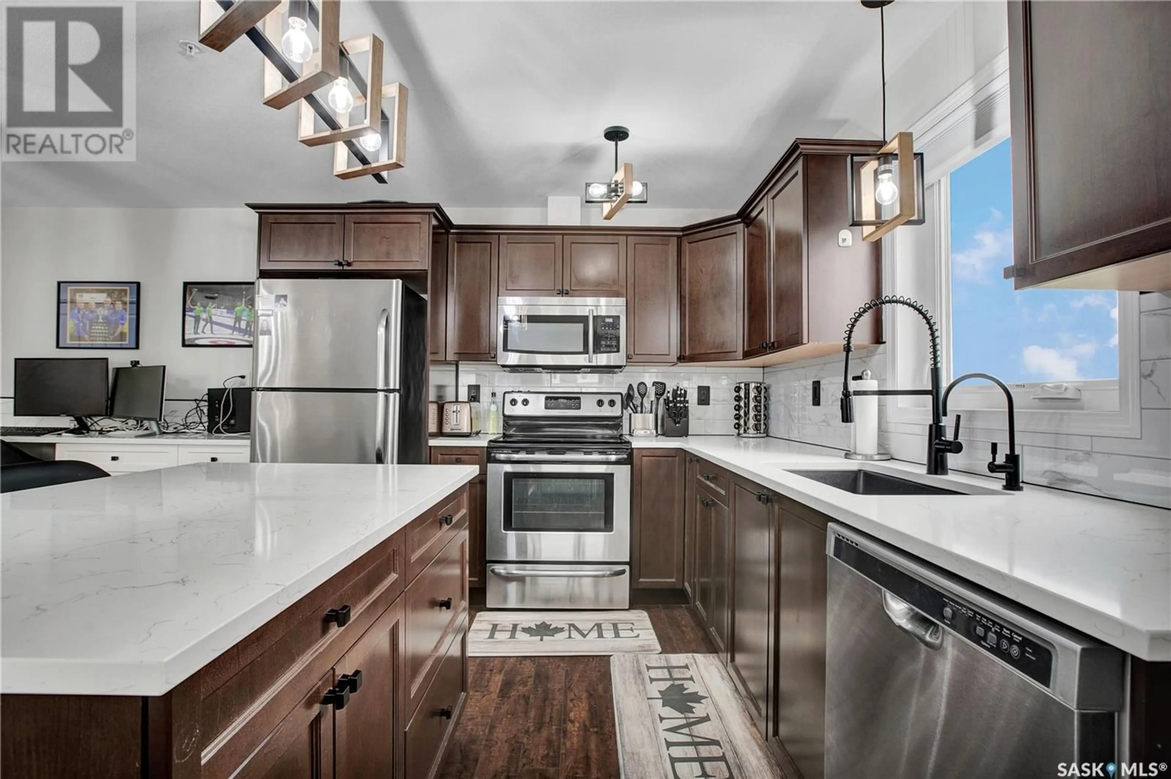 Open concept kitchen, ceramic/tile floor for 5212 110 WILLIS CRESCENT, Saskatoon Saskatchewan S7T0N5