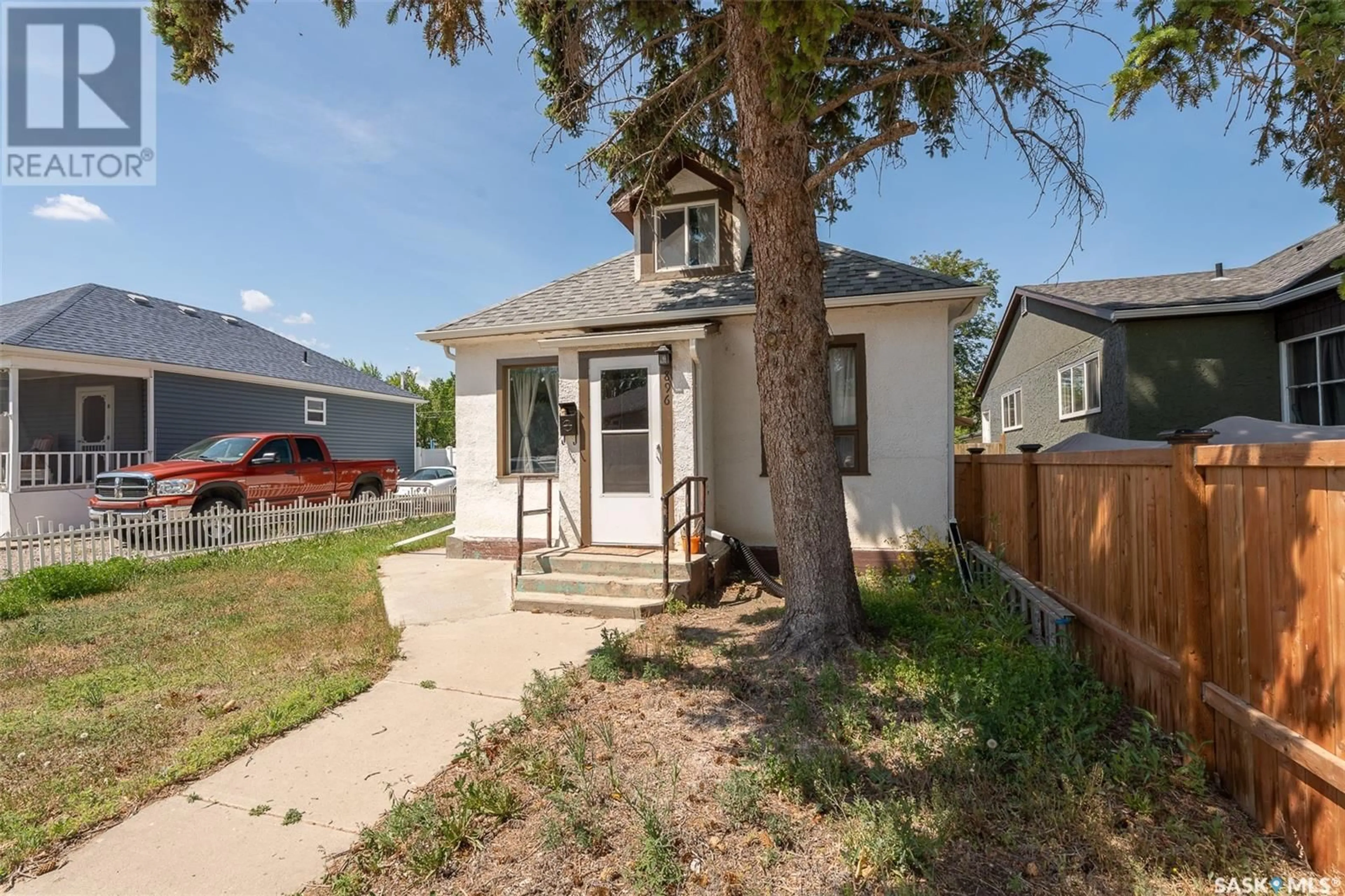 A pic from outside/outdoor area/front of a property/back of a property/a pic from drone, street for 896 GREY AVENUE, Moose Jaw Saskatchewan S6H1N1