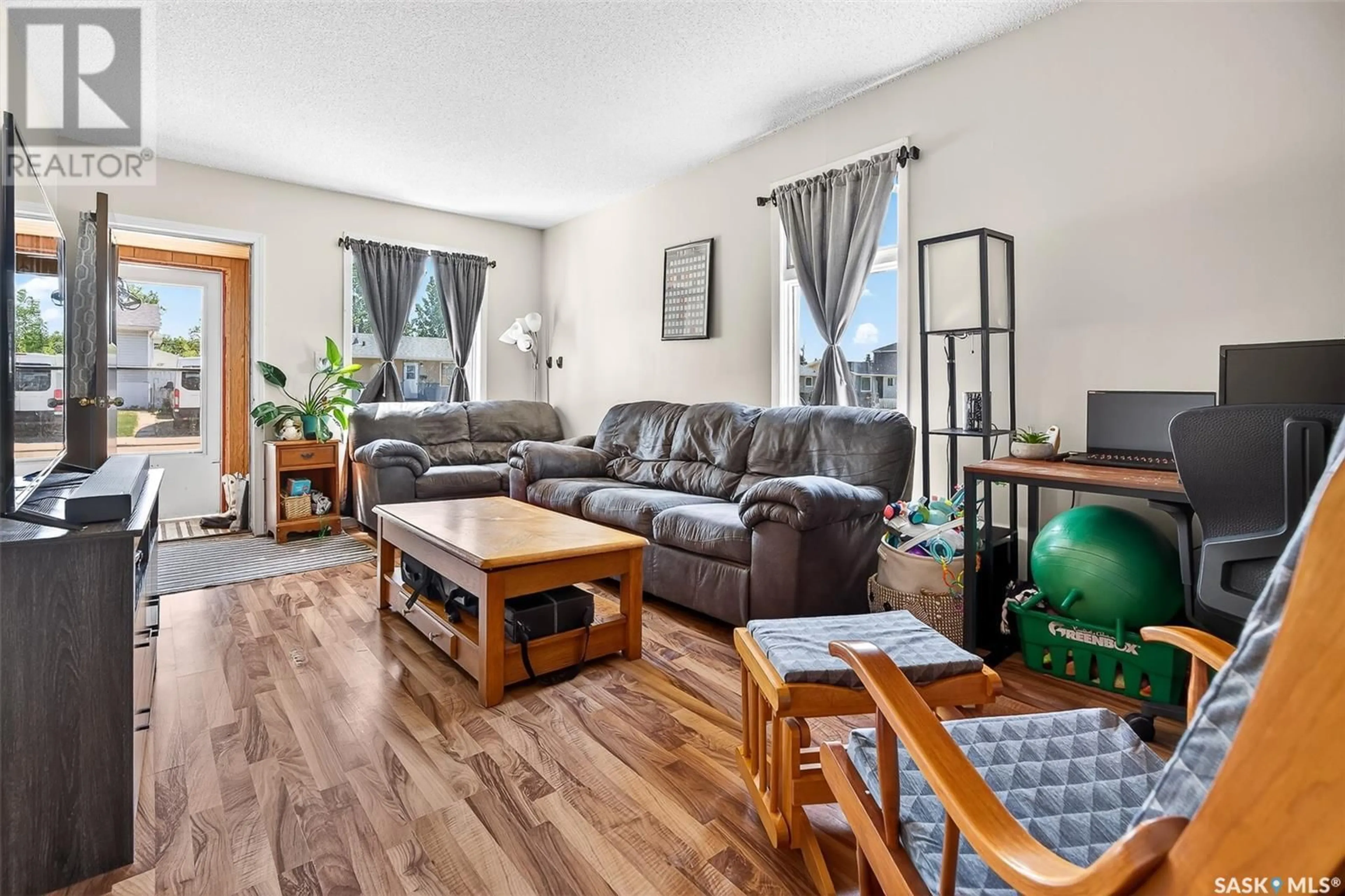 Living room with furniture, unknown for 896 GREY AVENUE, Moose Jaw Saskatchewan S6H1N1