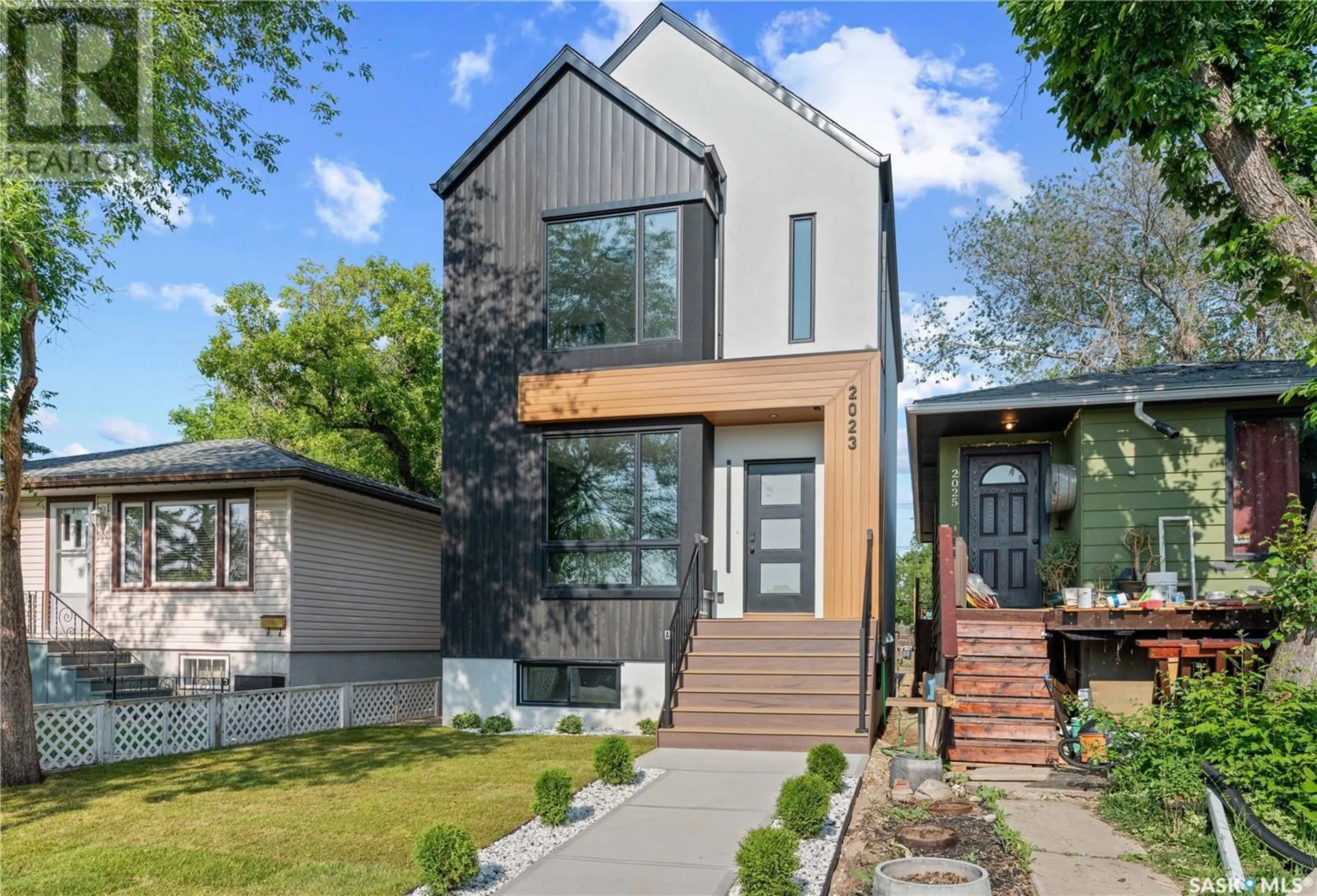 Home with brick exterior material, street for 2023 EDWARD STREET, Regina Saskatchewan S4T4N3
