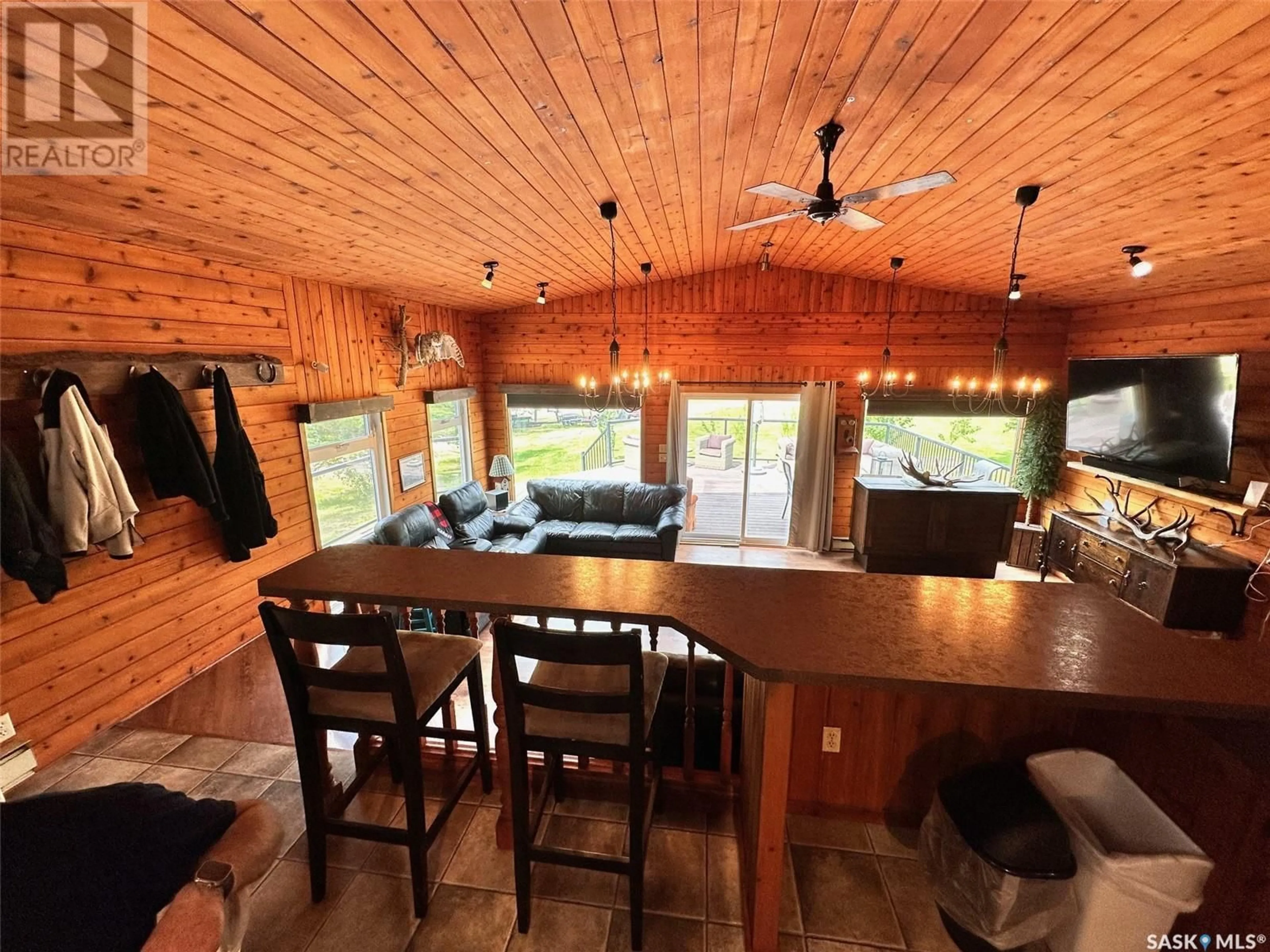 Open concept kitchen, wood/laminate floor for 232 SHELL LAKE CRESCENT, Echo Bay Saskatchewan S0J2G0