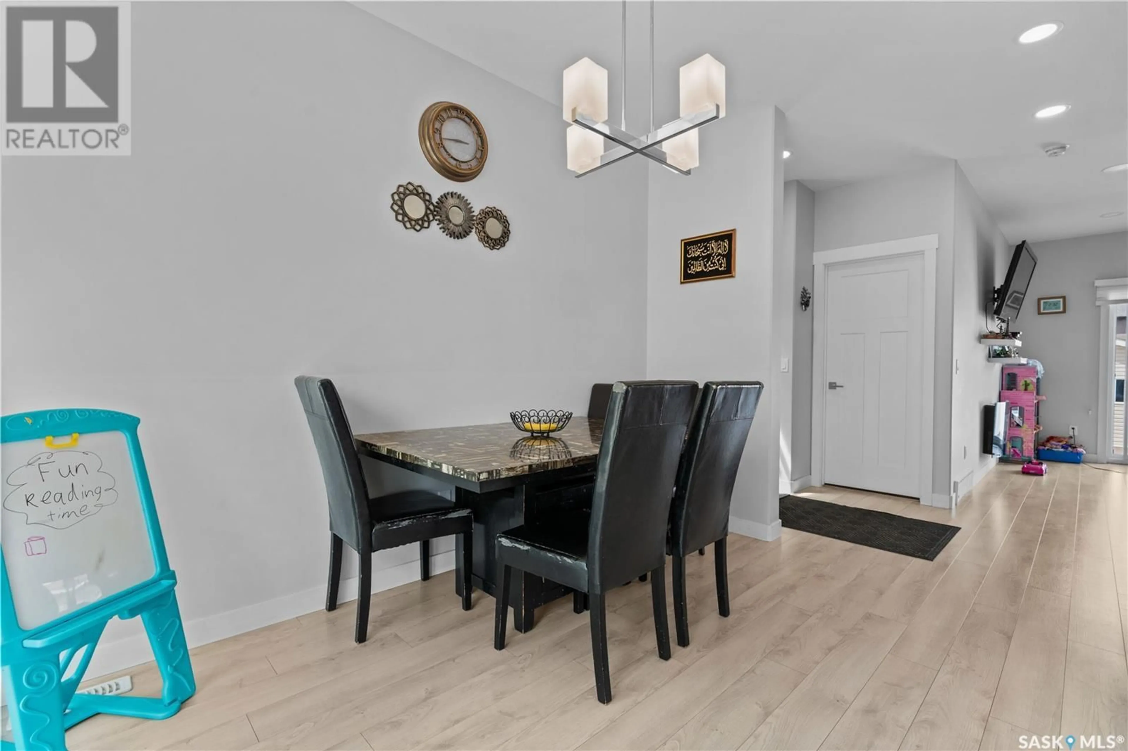 Dining room, wood/laminate floor for 5648 TUTOR WAY, Regina Saskatchewan S4W0N6