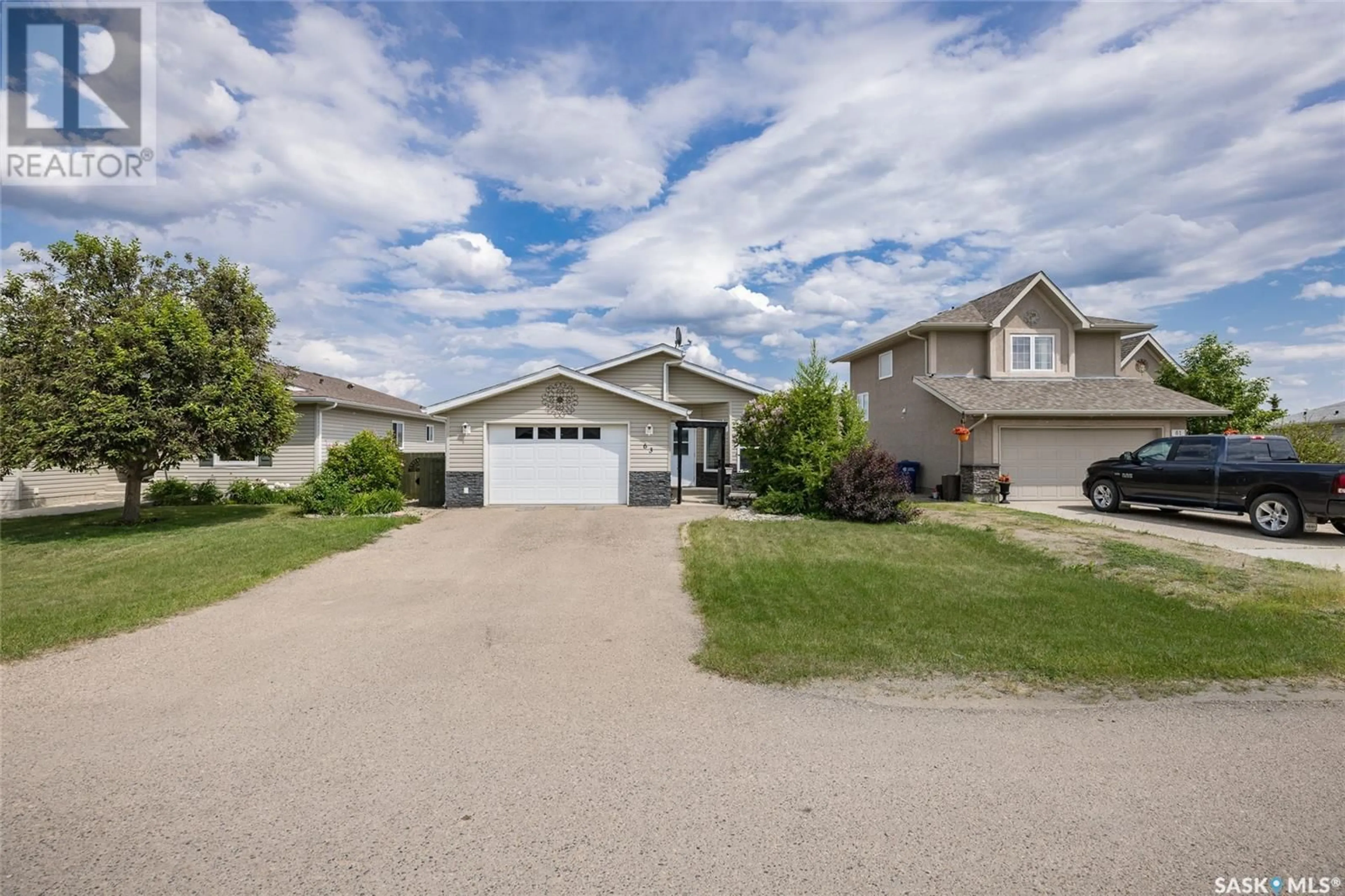 A pic from outside/outdoor area/front of a property/back of a property/a pic from drone, street for 63 PARADISE CIRCLE, White City Saskatchewan S4L0A1