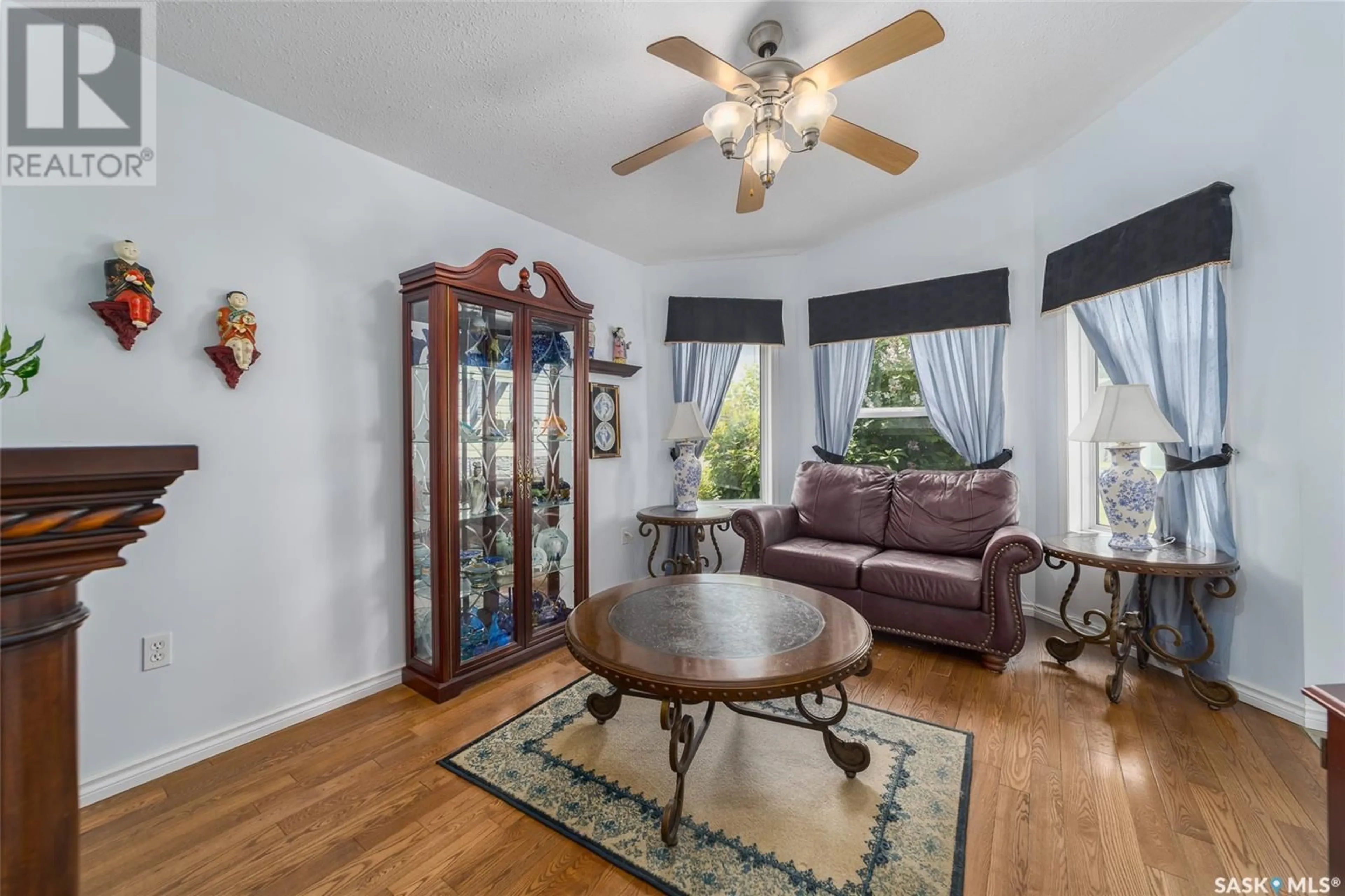 Living room with furniture, unknown for 63 PARADISE CIRCLE, White City Saskatchewan S4L0A1