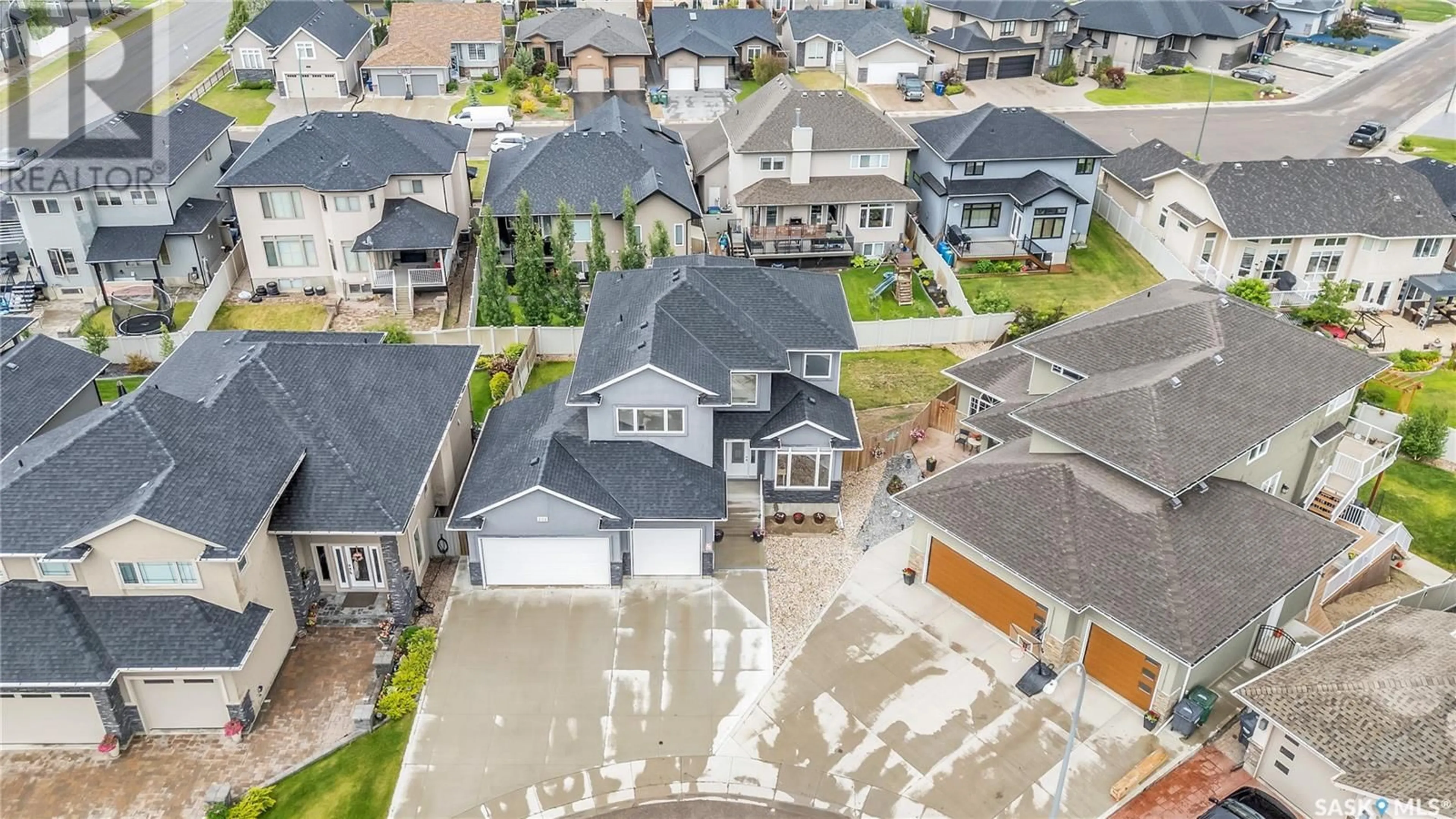 A pic from outside/outdoor area/front of a property/back of a property/a pic from drone, street for 131 ROCHELLE BAY, Saskatoon Saskatchewan S7V0H6
