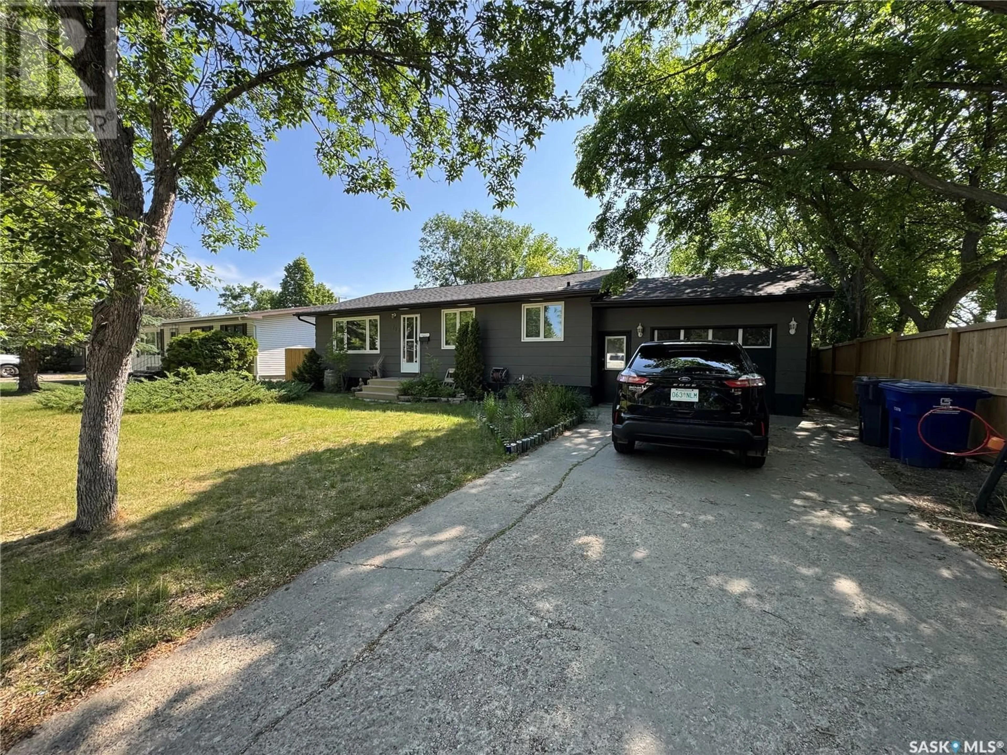 A pic from outside/outdoor area/front of a property/back of a property/a pic from drone, street for 708 BRIMACOMBE DRIVE, Weyburn Saskatchewan S4H0A2
