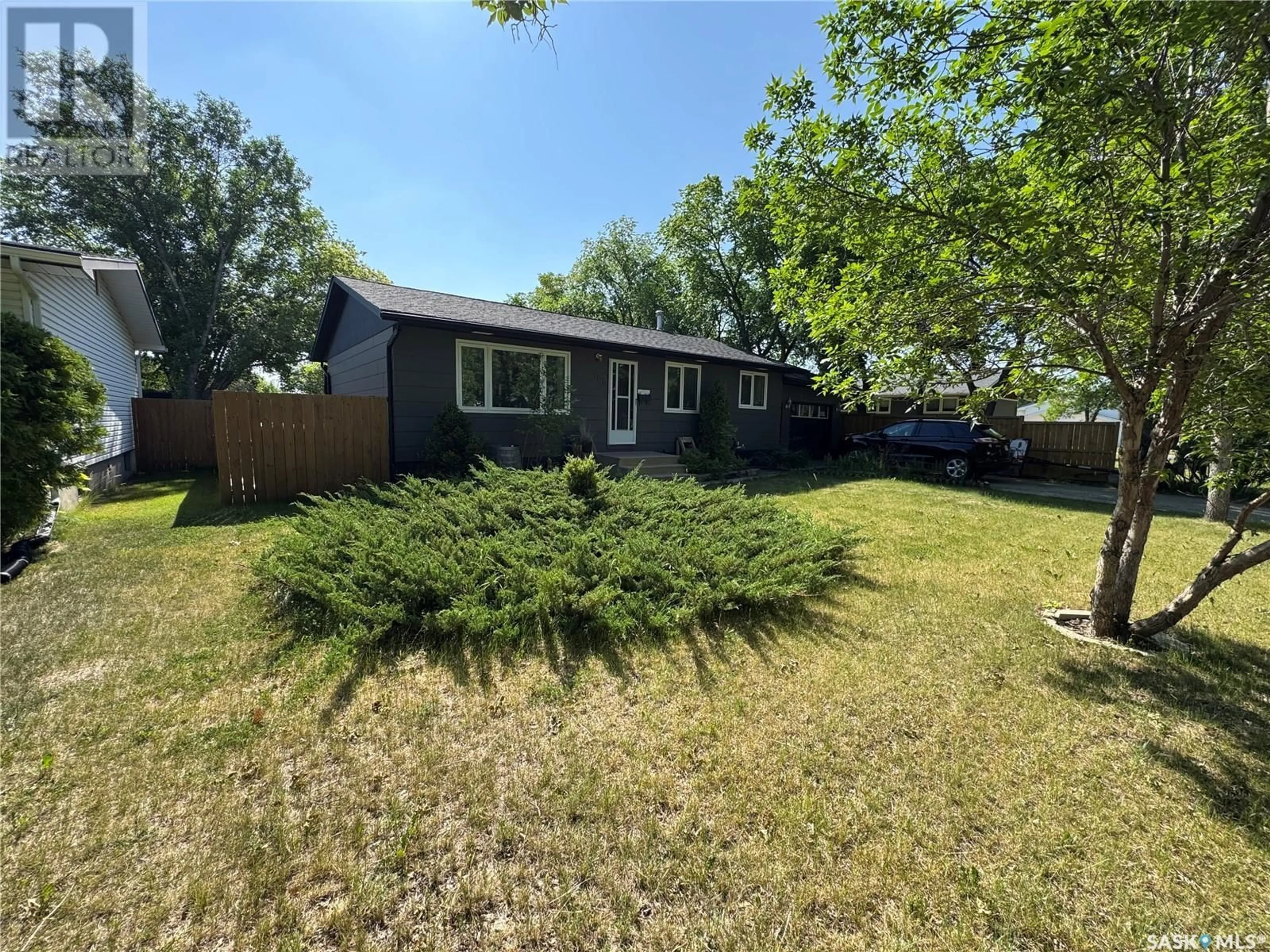 A pic from outside/outdoor area/front of a property/back of a property/a pic from drone, street for 708 BRIMACOMBE DRIVE, Weyburn Saskatchewan S4H0A2