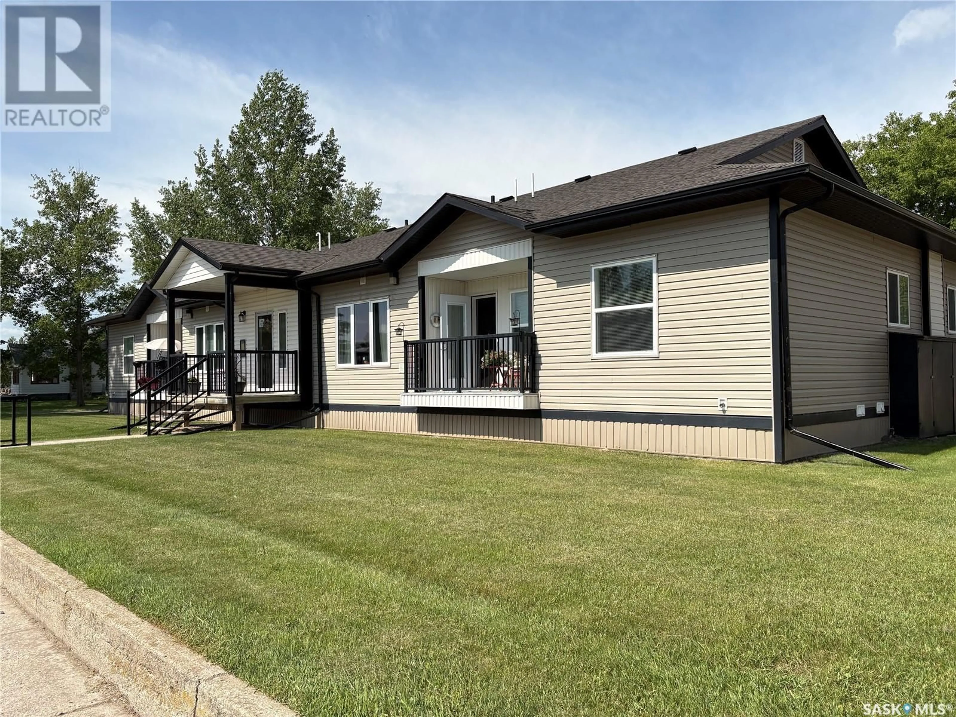 Home with vinyl exterior material, street for 103 - 120 WELLS AVENUE, Langenburg Saskatchewan S0A2A0