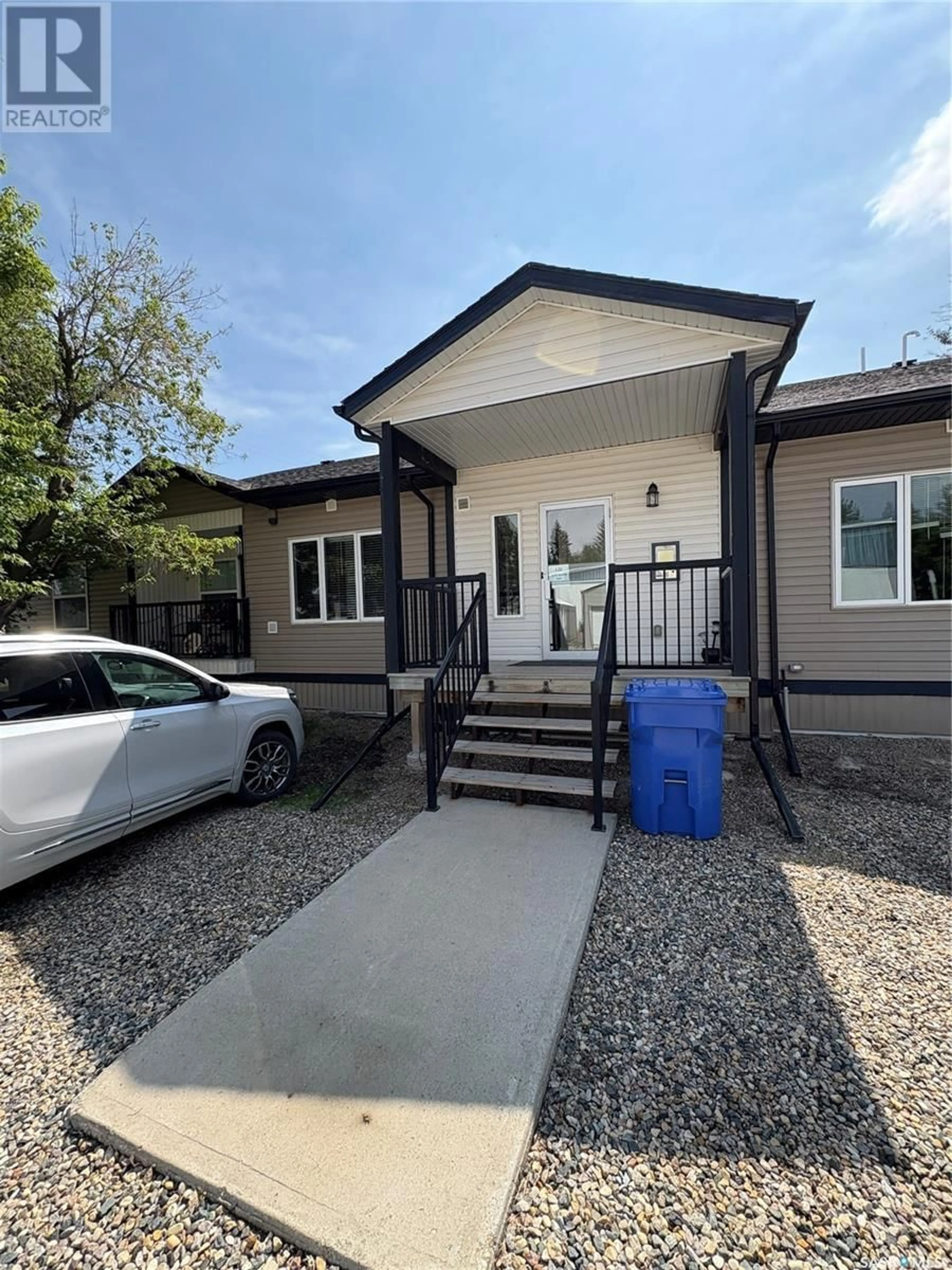 Home with vinyl exterior material, street for 103 - 120 WELLS AVENUE, Langenburg Saskatchewan S0A2A0