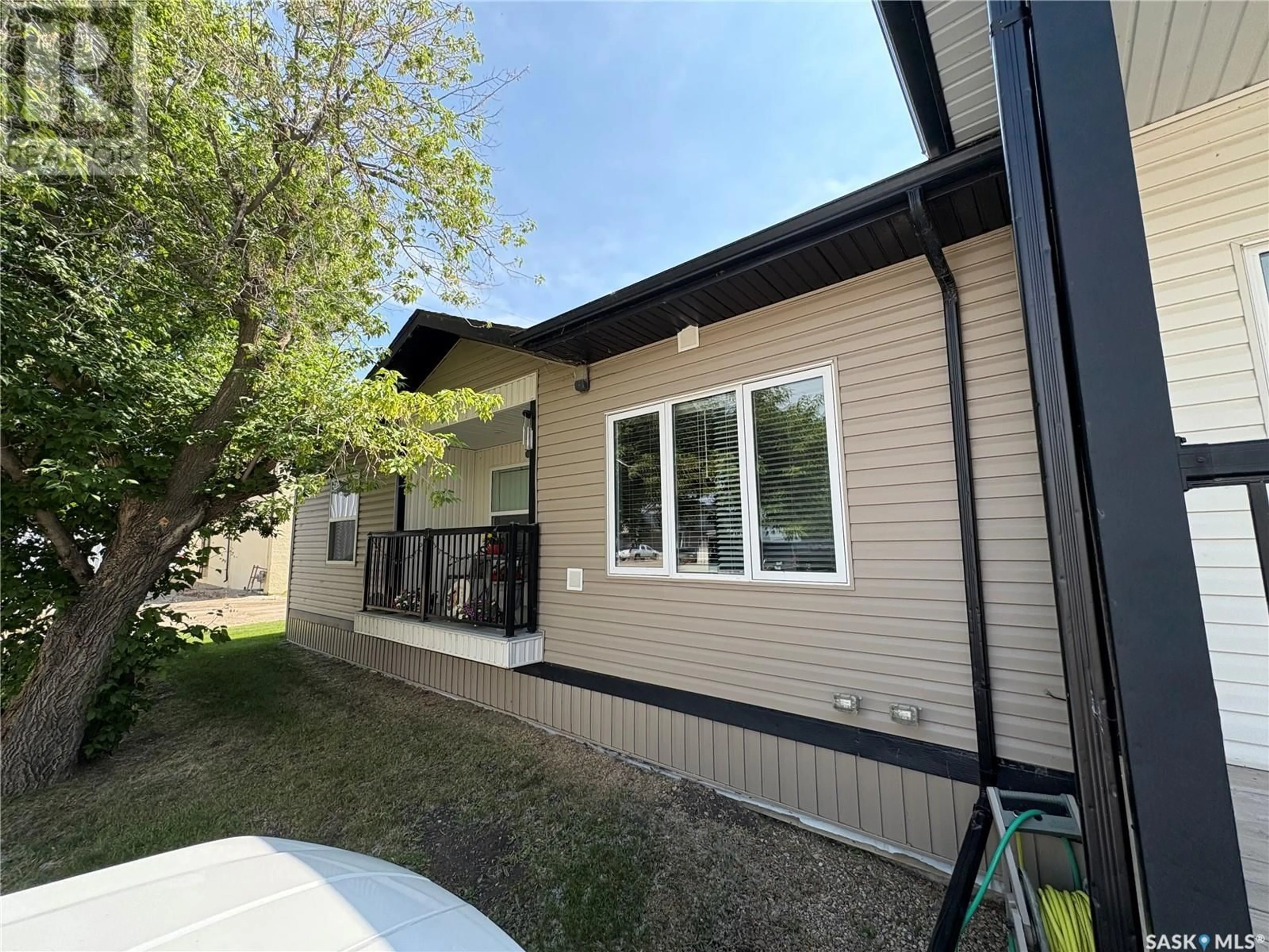 Home with vinyl exterior material, street for 103 - 120 WELLS AVENUE, Langenburg Saskatchewan S0A2A0