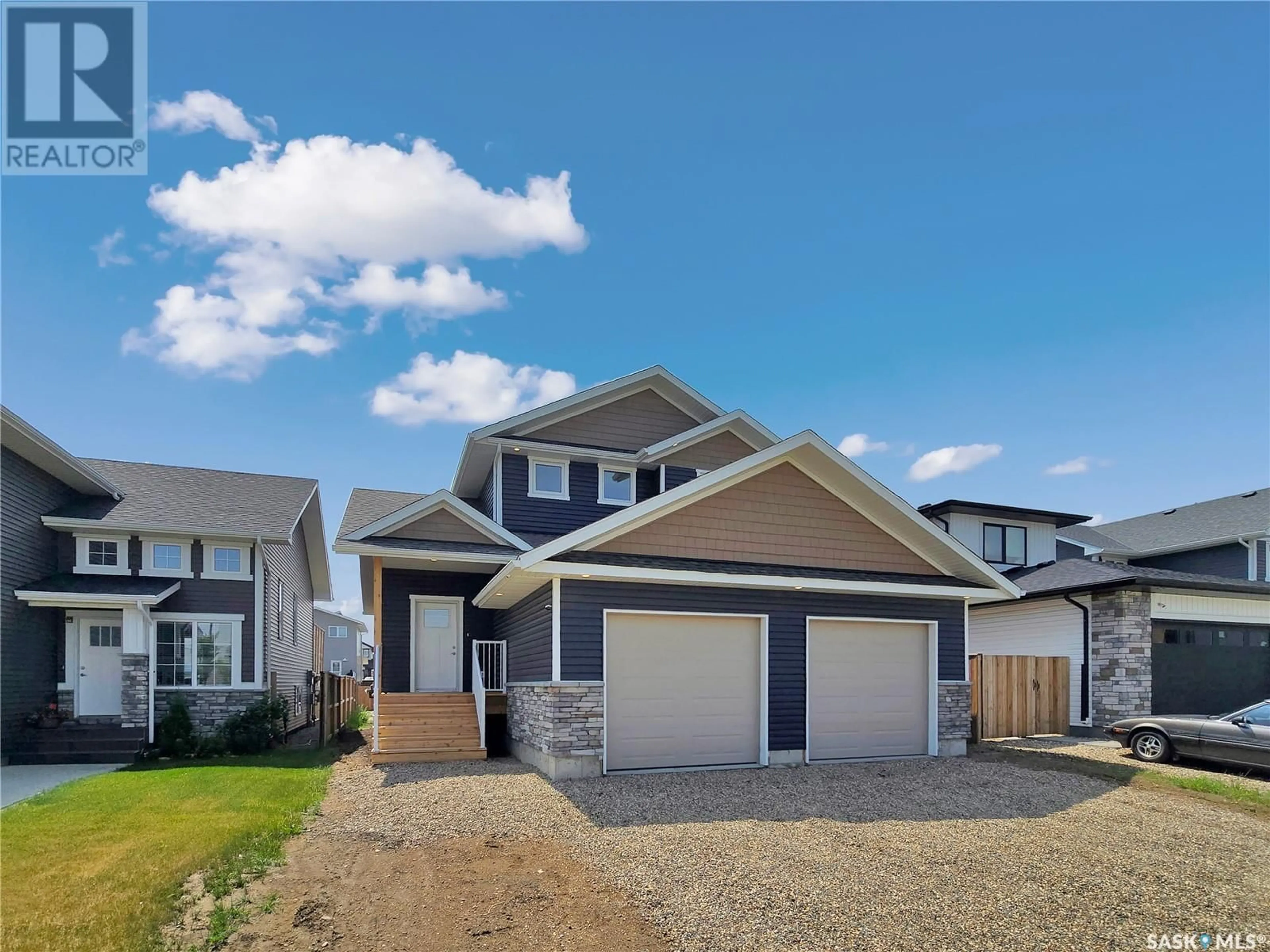 Home with vinyl exterior material, street for 1352 PARR HILL DRIVE, Martensville Saskatchewan S0K2T1