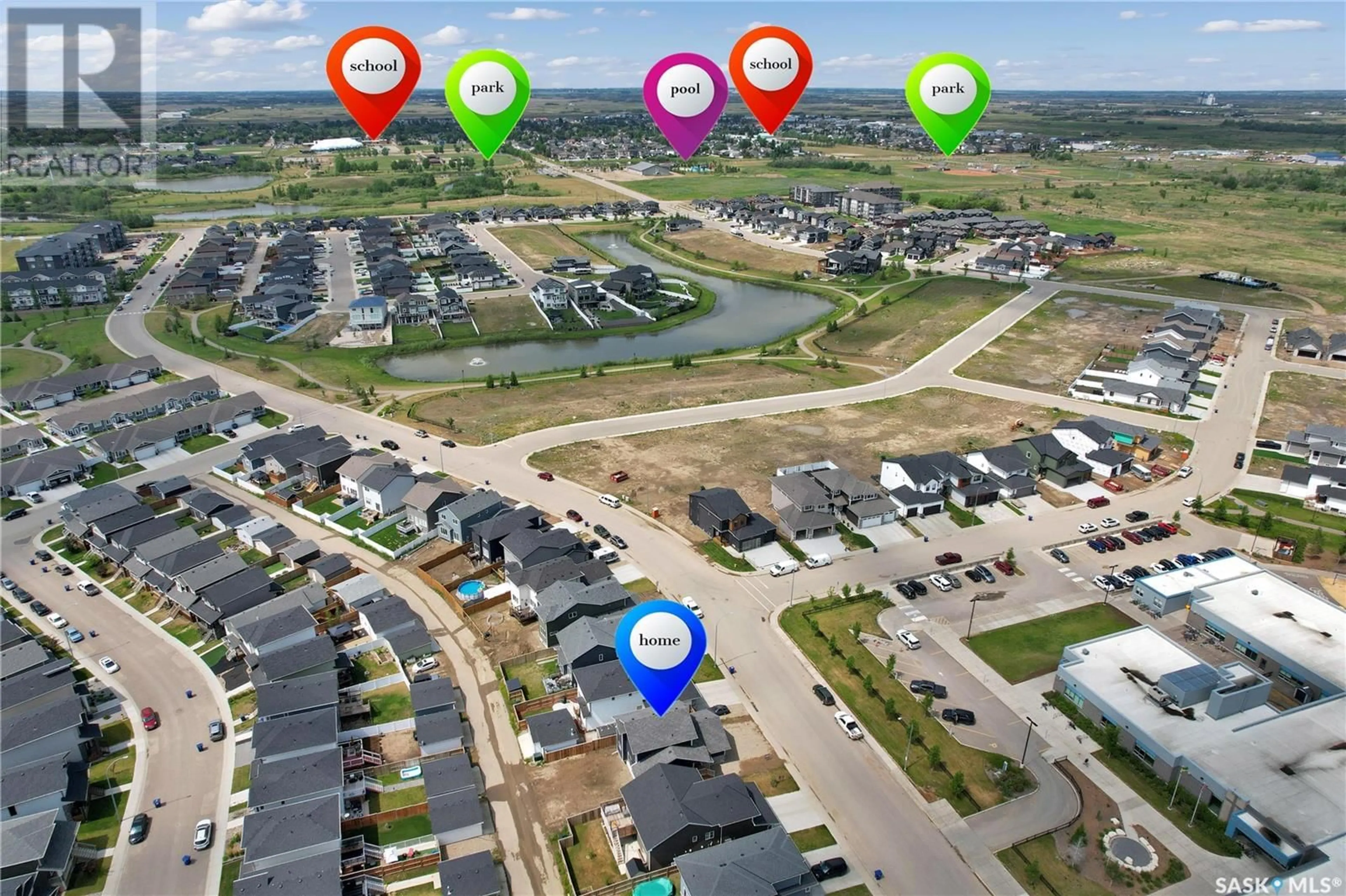 A pic from outside/outdoor area/front of a property/back of a property/a pic from drone, street for 1352 PARR HILL DRIVE, Martensville Saskatchewan S0K2T1