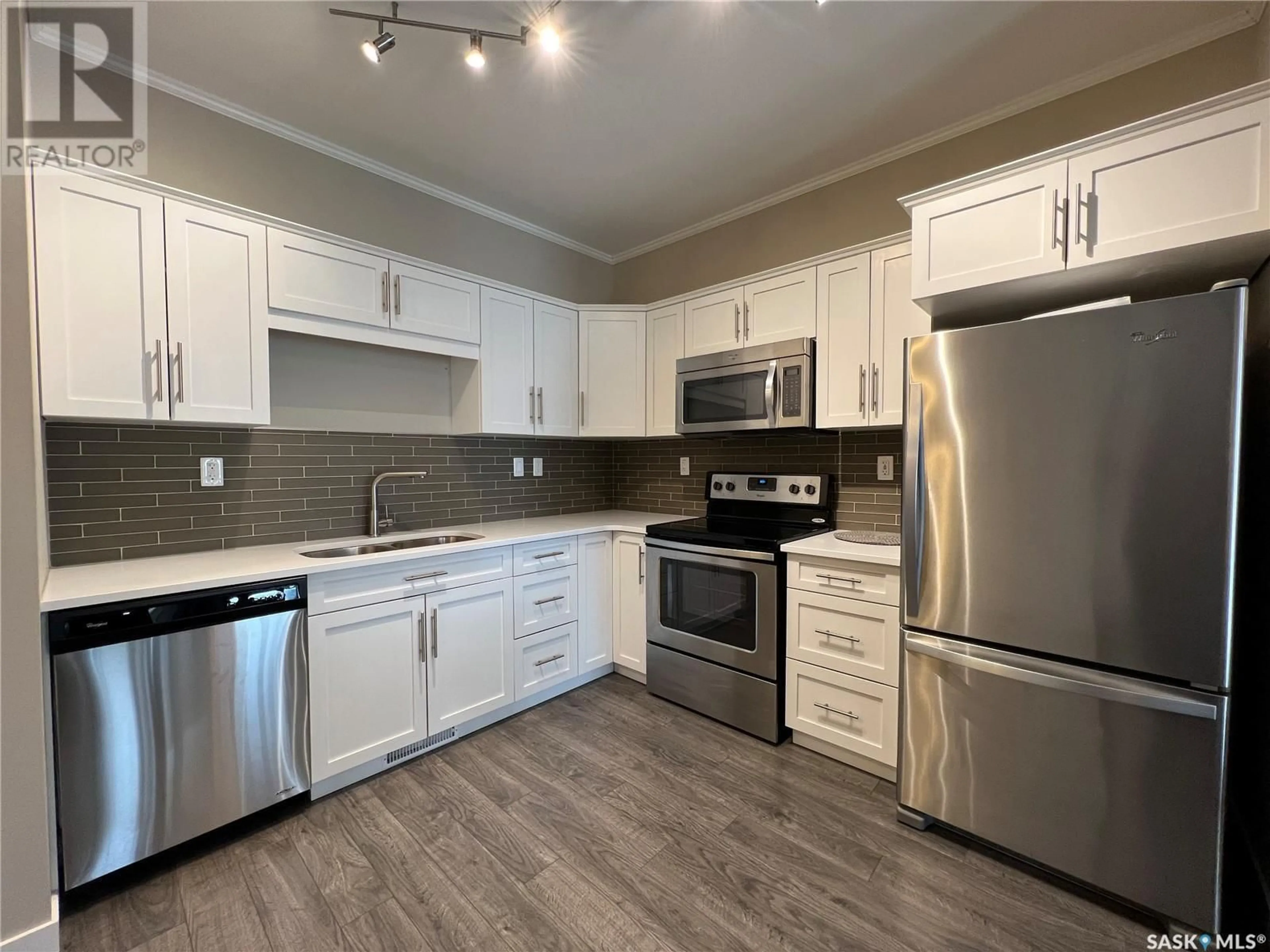 Open concept kitchen, unknown for 110 - 720 BALTZAN BOULEVARD, Saskatoon Saskatchewan S7W0G6