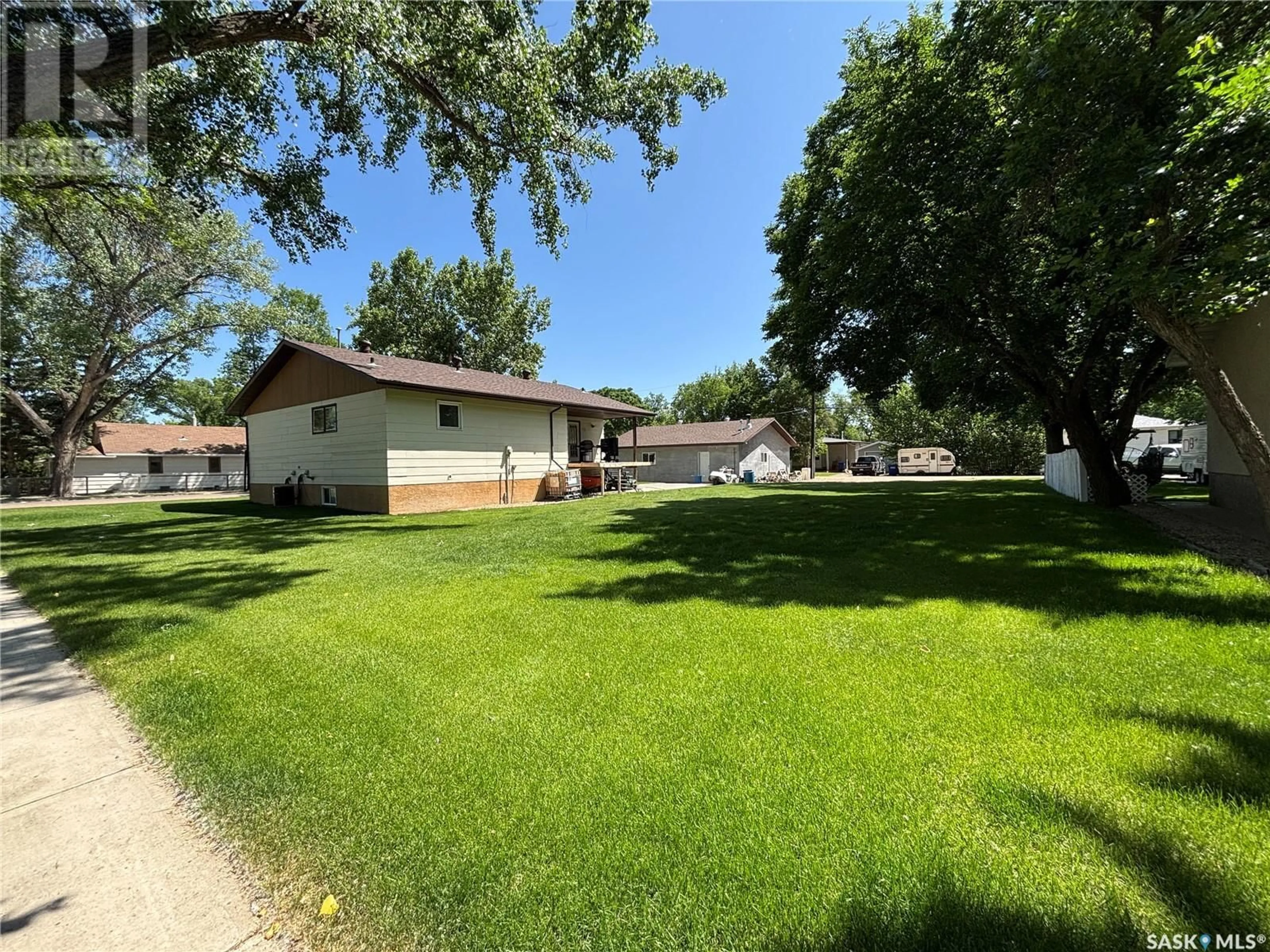 A pic from outside/outdoor area/front of a property/back of a property/a pic from drone, street for 202 WALSH STREET, Maple Creek Saskatchewan S0N1N0