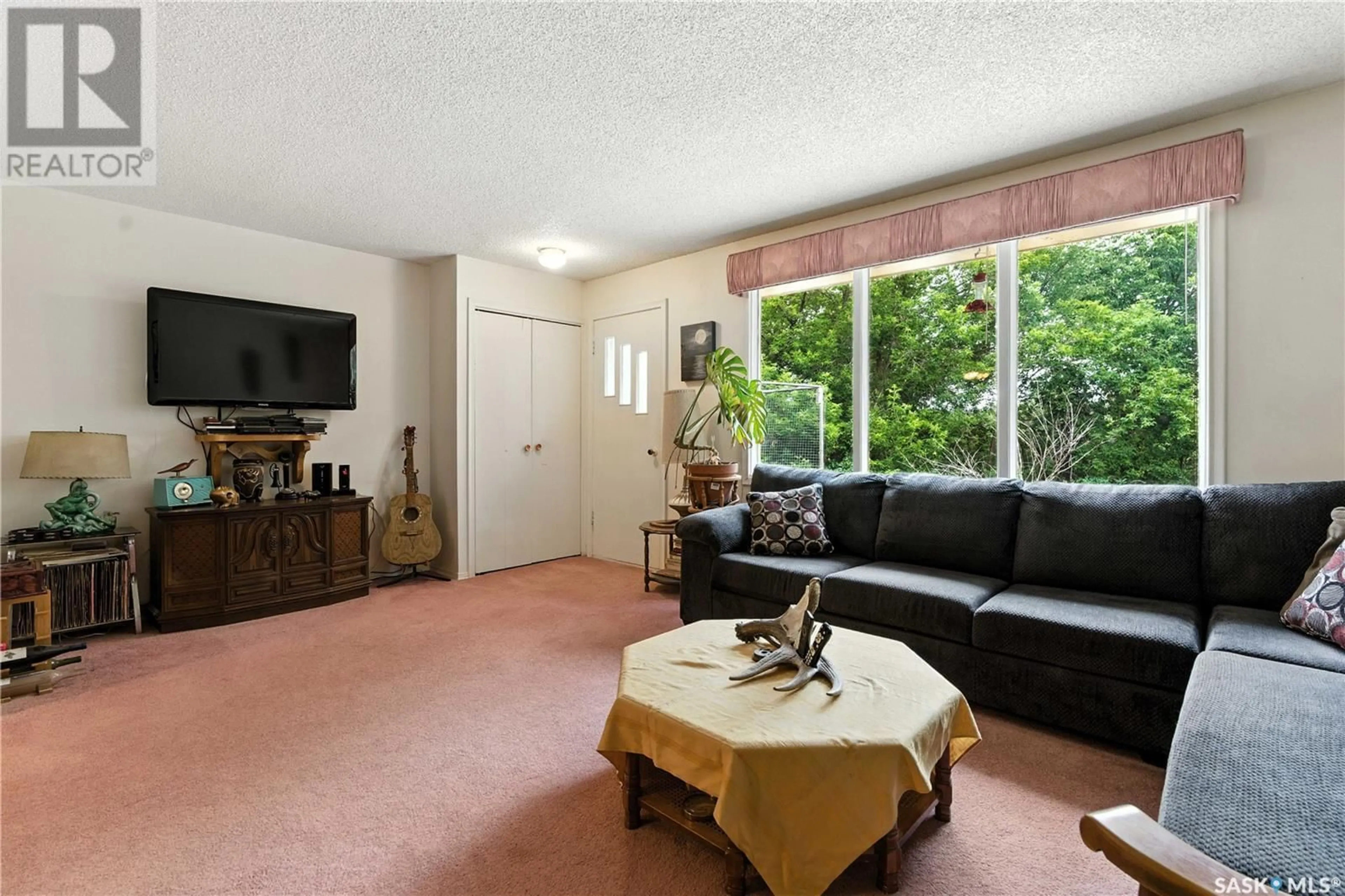 Living room with furniture, unknown for 75 QU'APPELLE DRIVE, Lumsden Saskatchewan S0G3C0