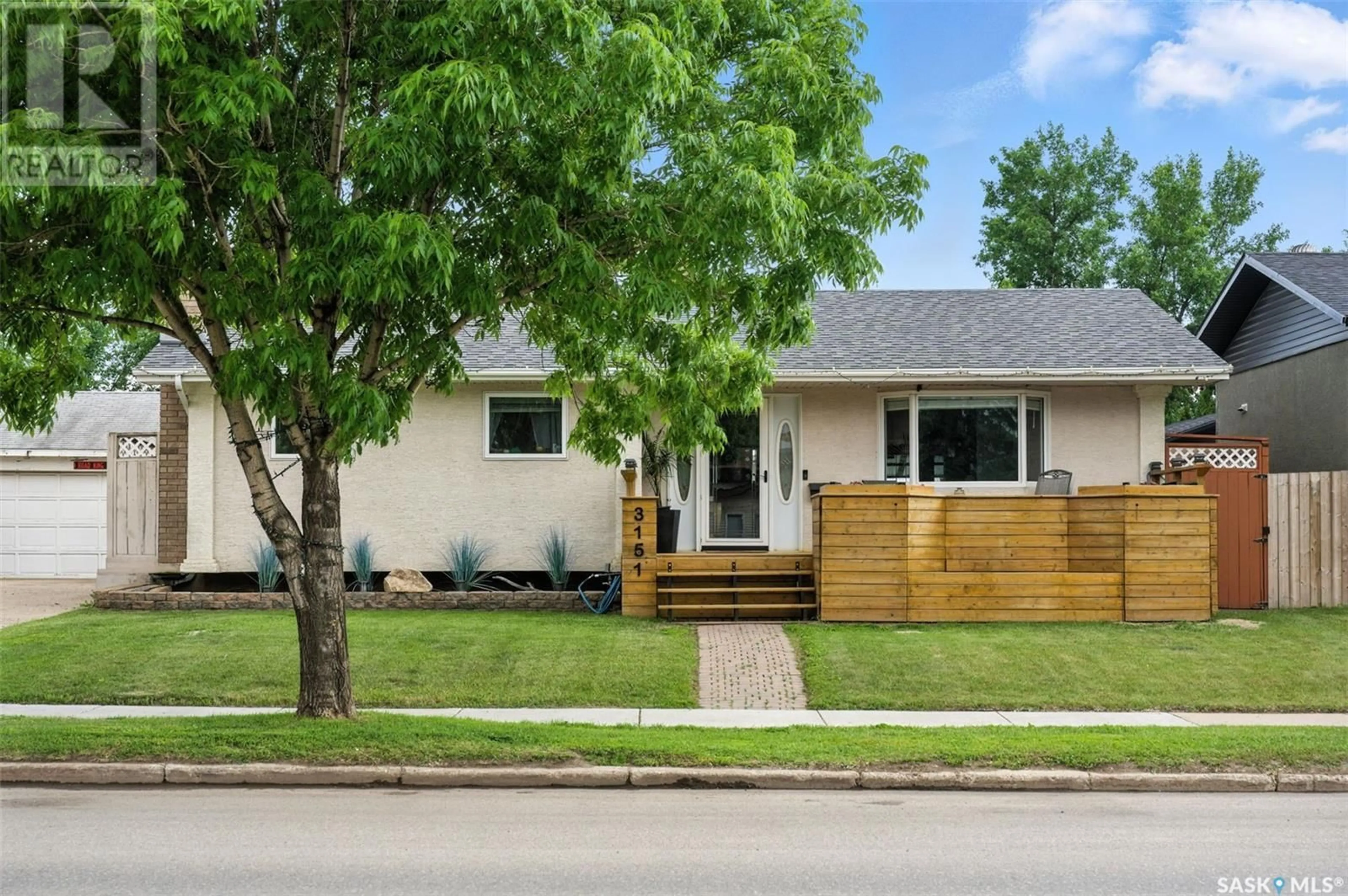 Home with vinyl exterior material, street for 3151 33RD STREET, Saskatoon Saskatchewan S7L0X8