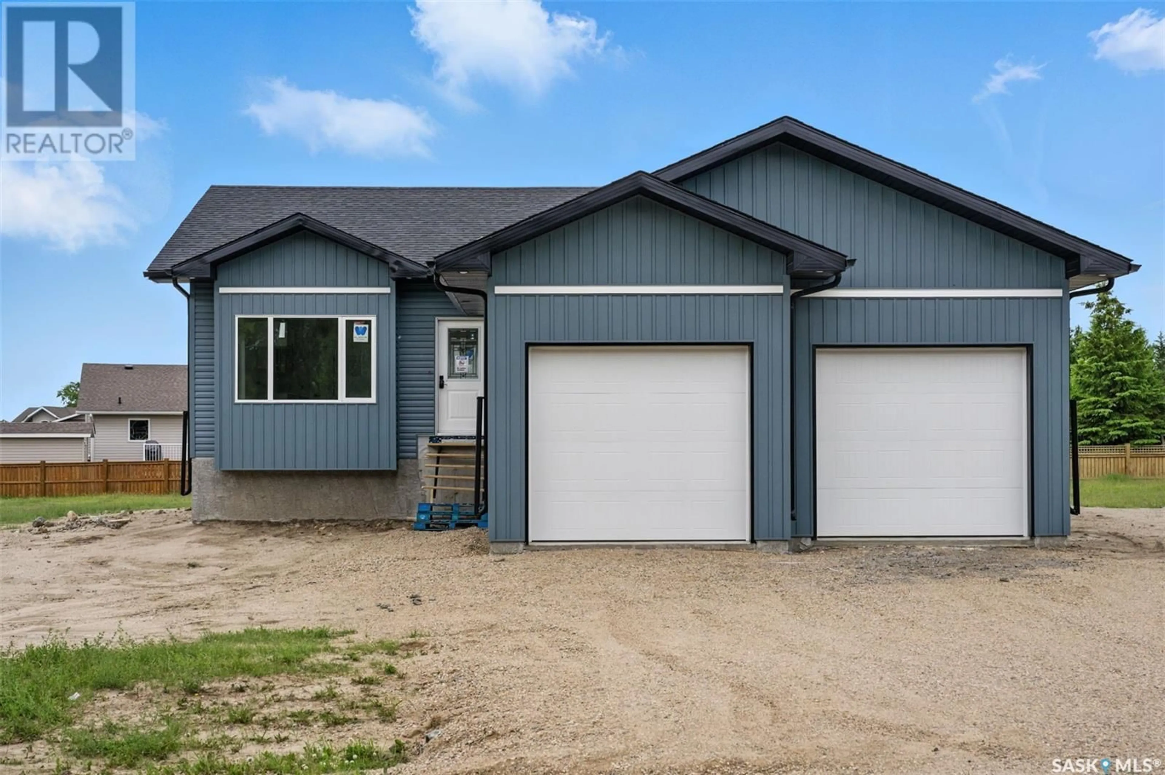 Home with vinyl exterior material, street for 210 2ND AVENUE S, Waldheim Saskatchewan S0K4R0