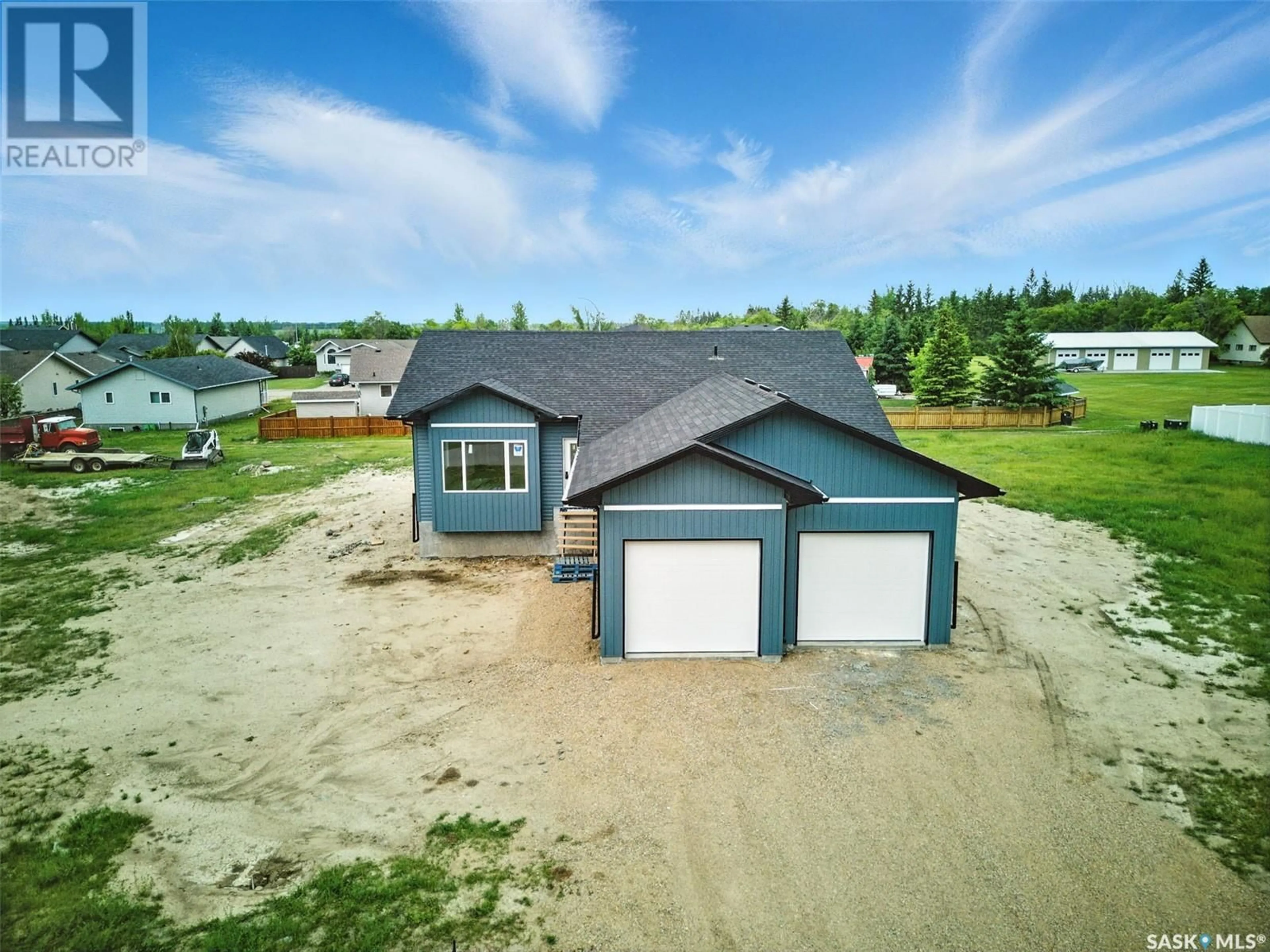 A pic from outside/outdoor area/front of a property/back of a property/a pic from drone, unknown for 210 2ND AVENUE S, Waldheim Saskatchewan S0K4R0