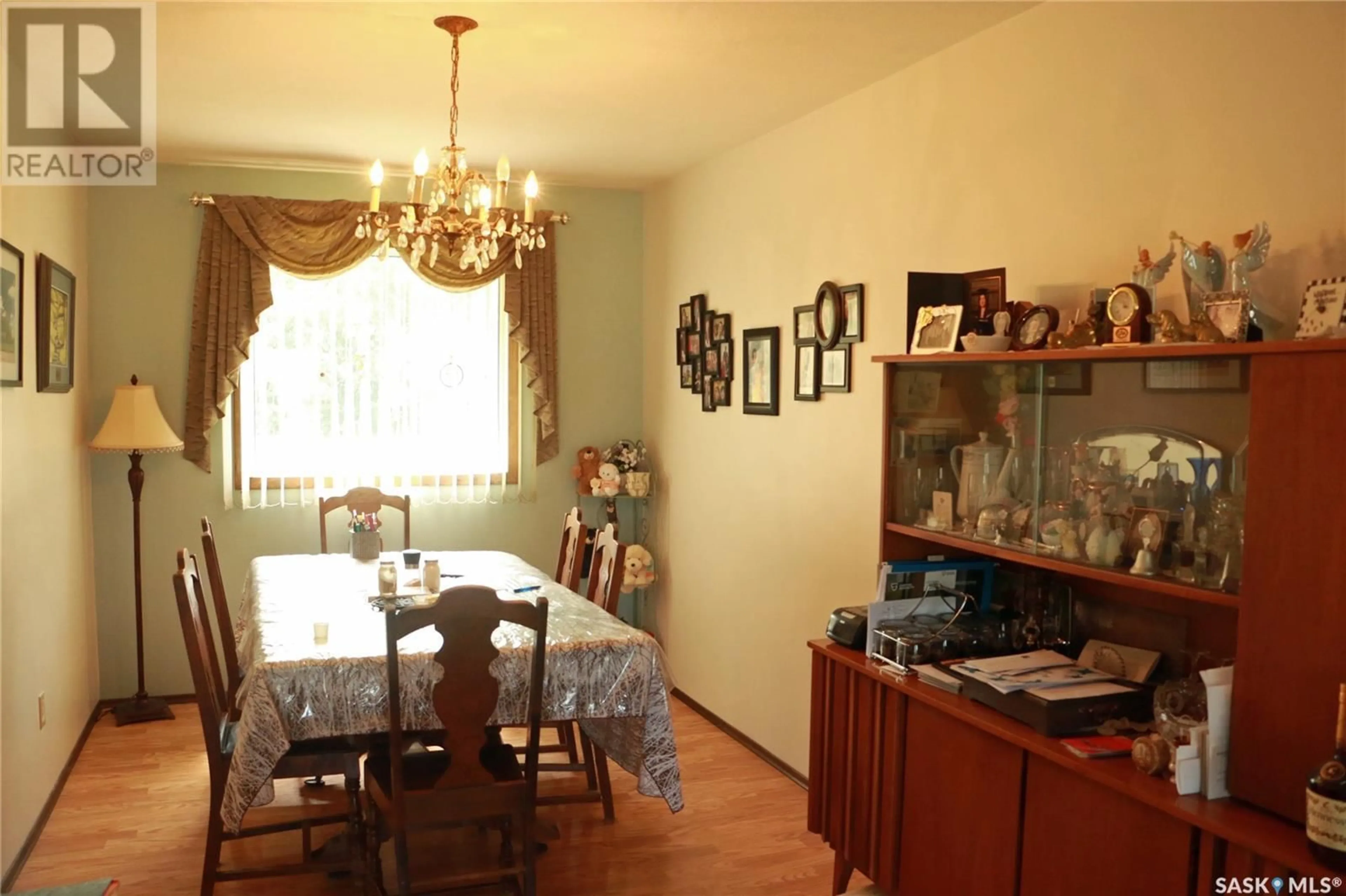 Dining room, wood/laminate floor for 304 ROSHER STREET, Colonsay Saskatchewan S0K0Z0