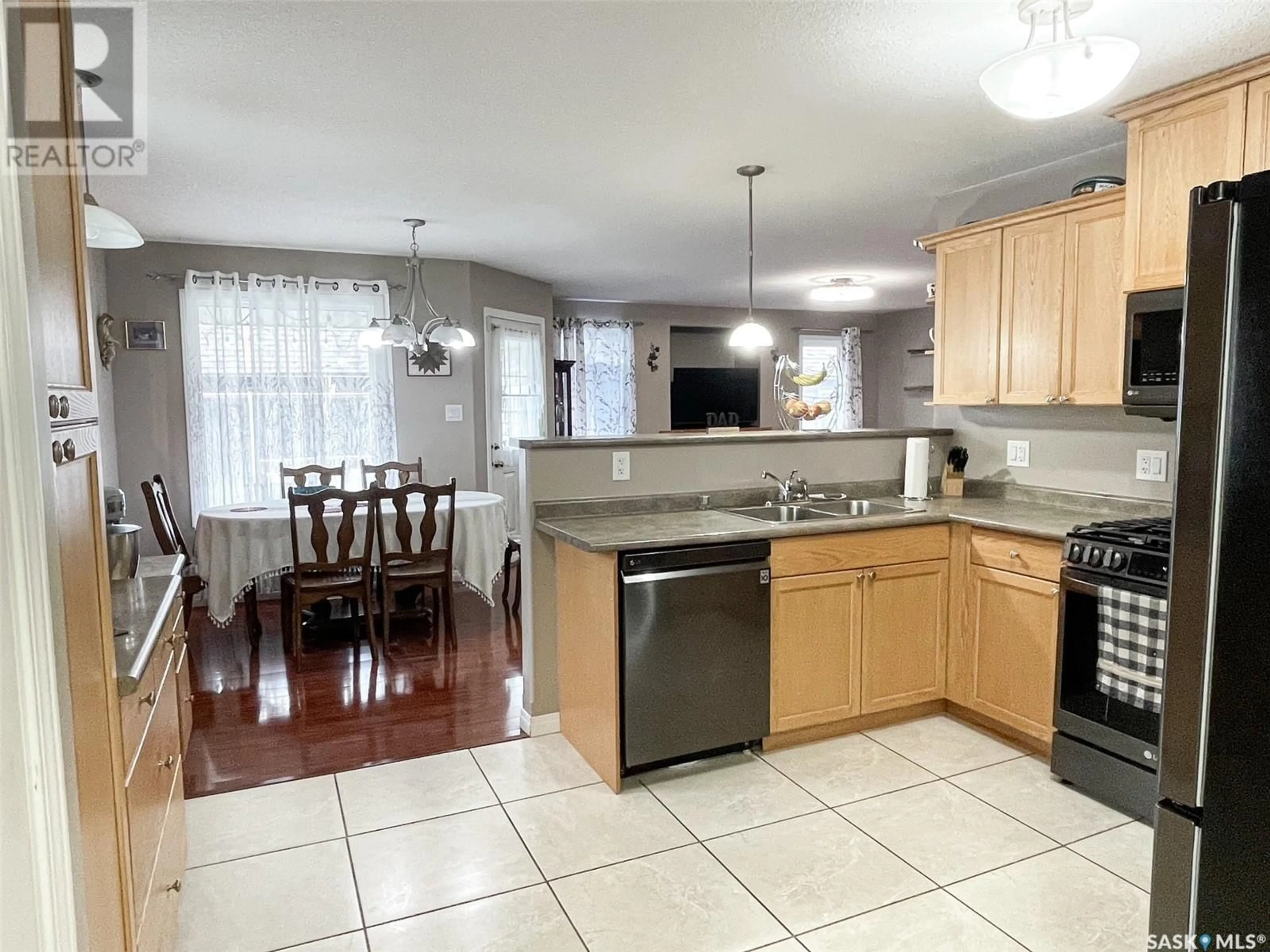 Open concept kitchen, ceramic/tile floor for 7 FAIRWAY COURT, Meadow Lake Saskatchewan S9X1Z9