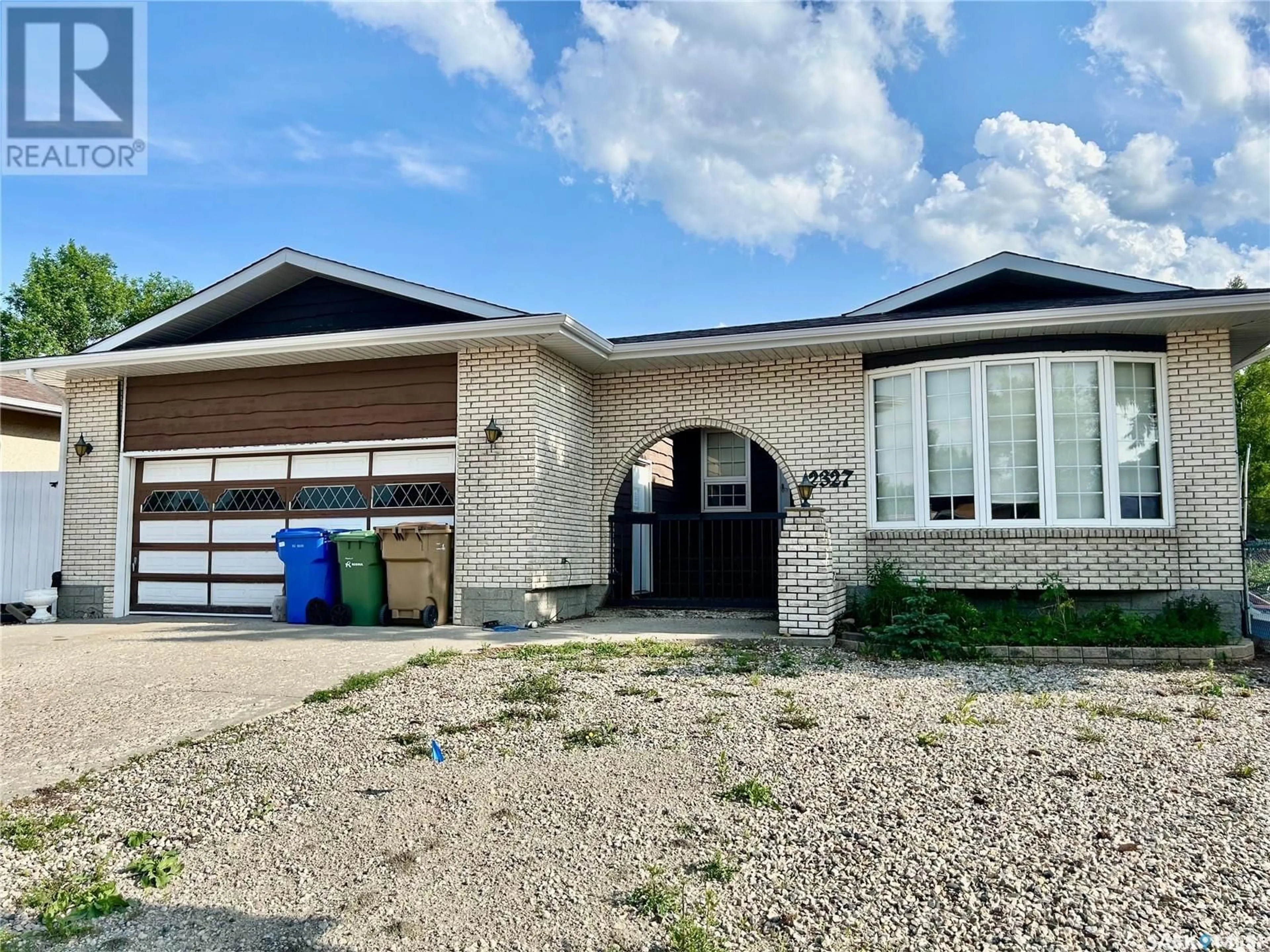 Home with brick exterior material, street for 2327 12TH AVENUE, Regina Saskatchewan S4R7J9
