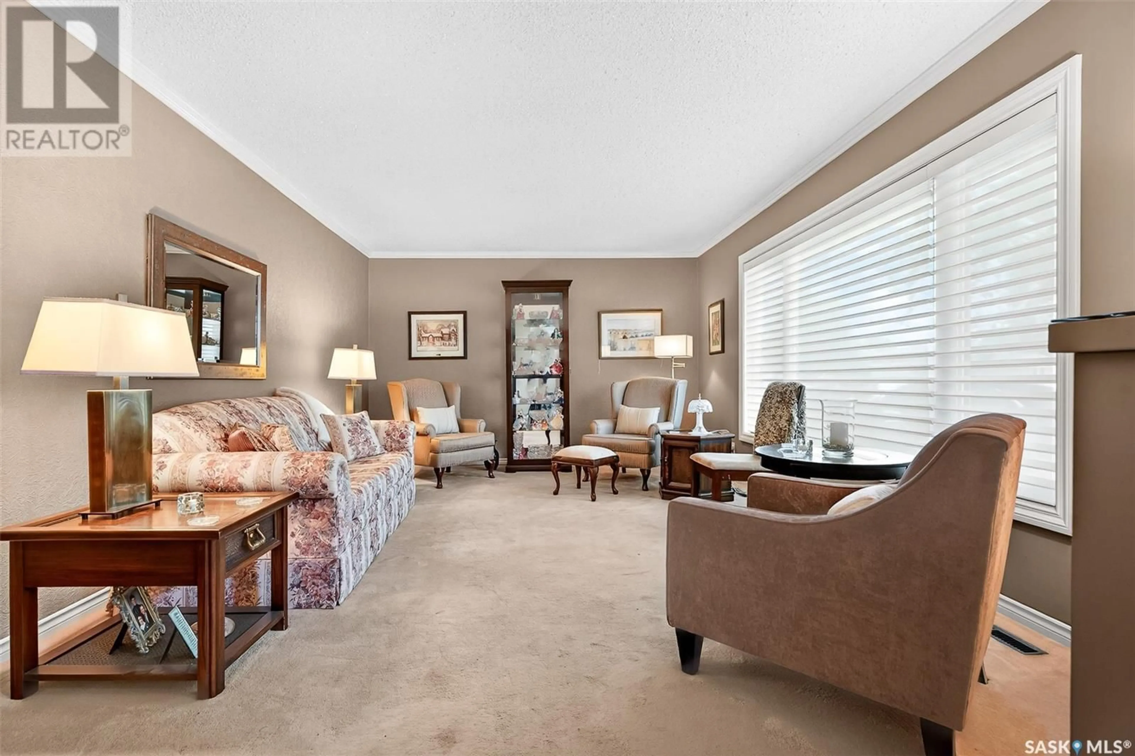 Living room with furniture, carpet floor for 1047 JAMES STREET, Moose Jaw Saskatchewan S6H3H8