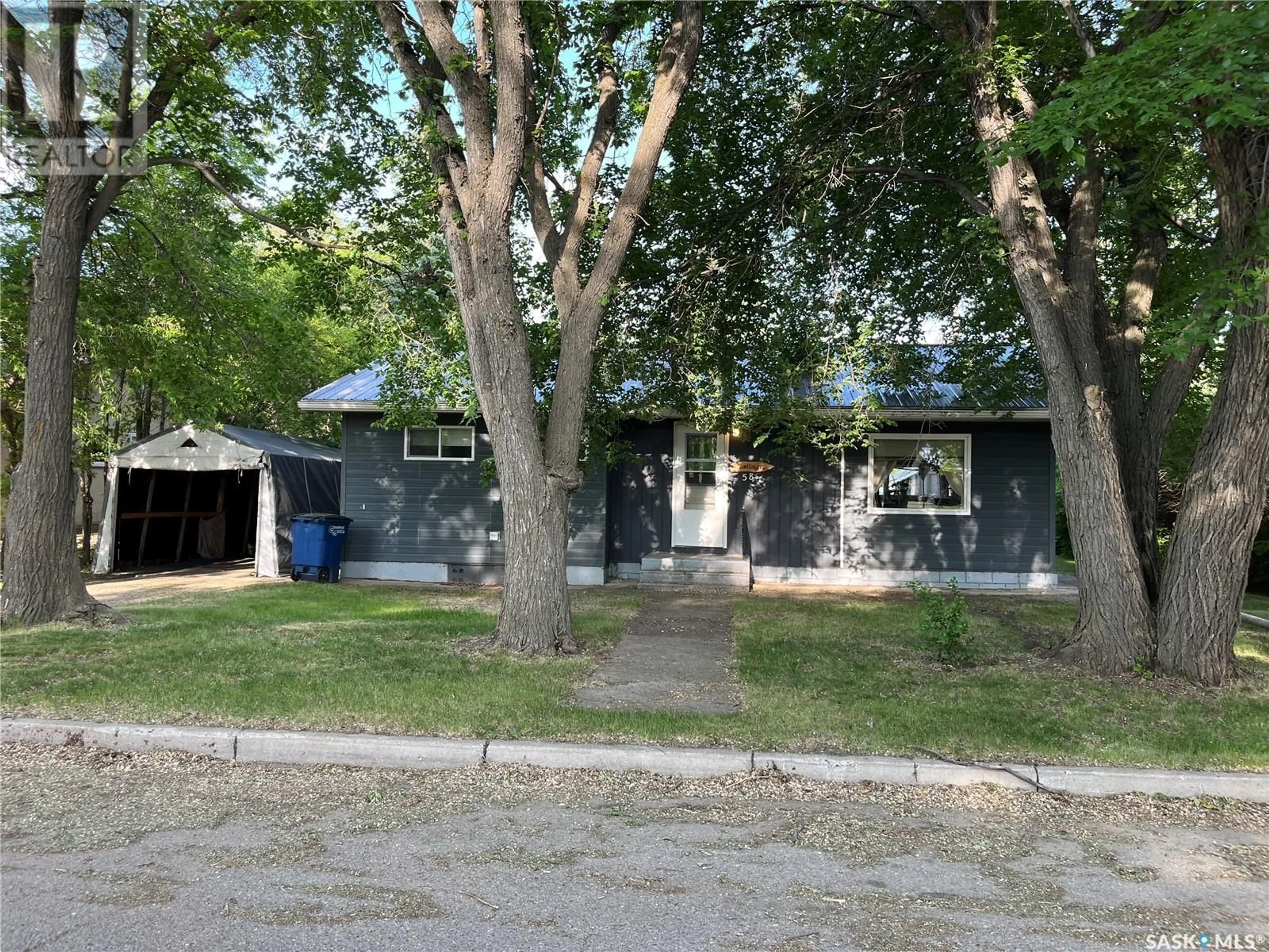 A pic from outside/outdoor area/front of a property/back of a property/a pic from drone, street for 58 2ND STREET, Wadena Saskatchewan S0A4J0