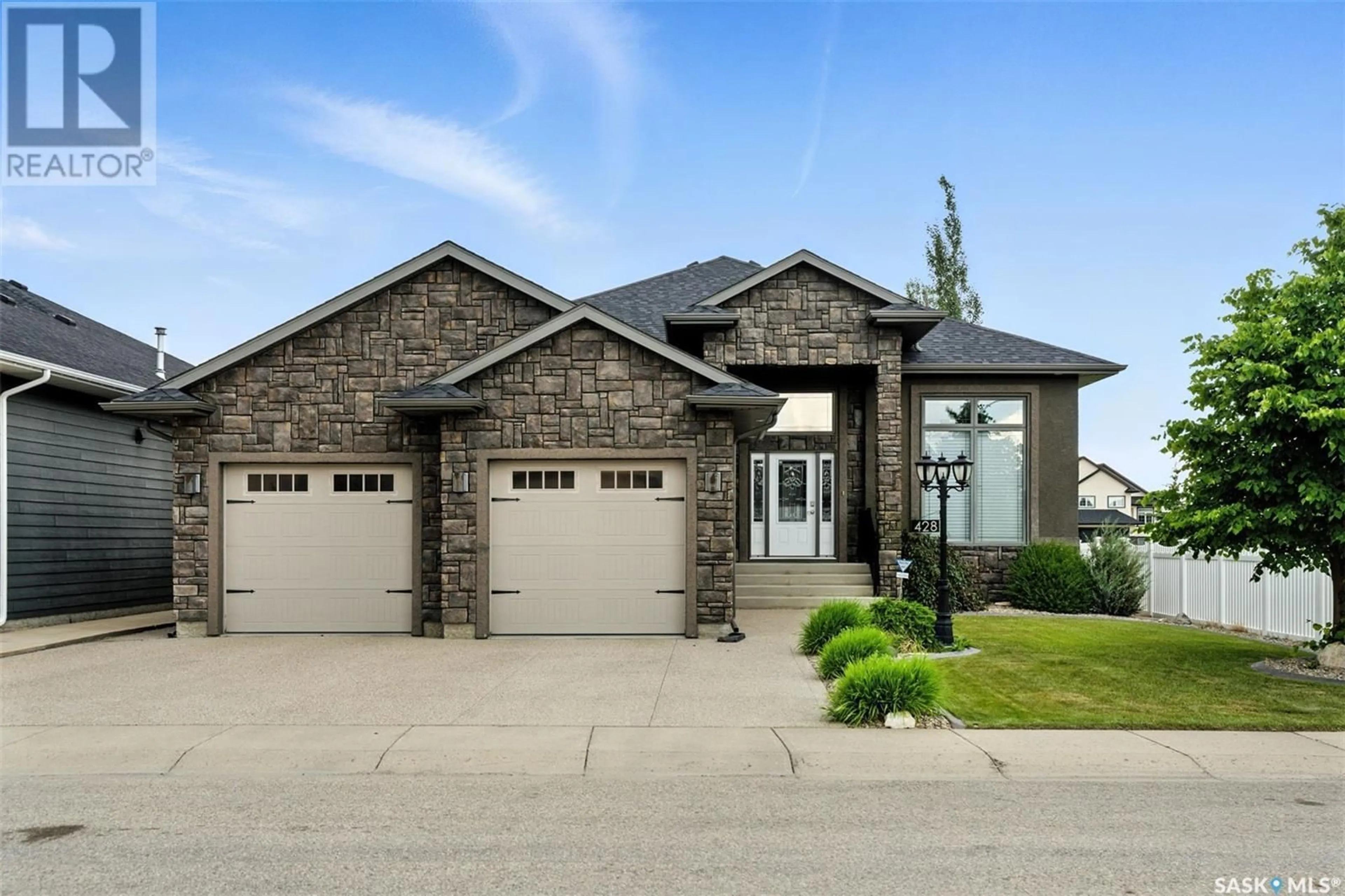 Home with brick exterior material, street for 428 FALDO CRESCENT, Warman Saskatchewan S0K4S1