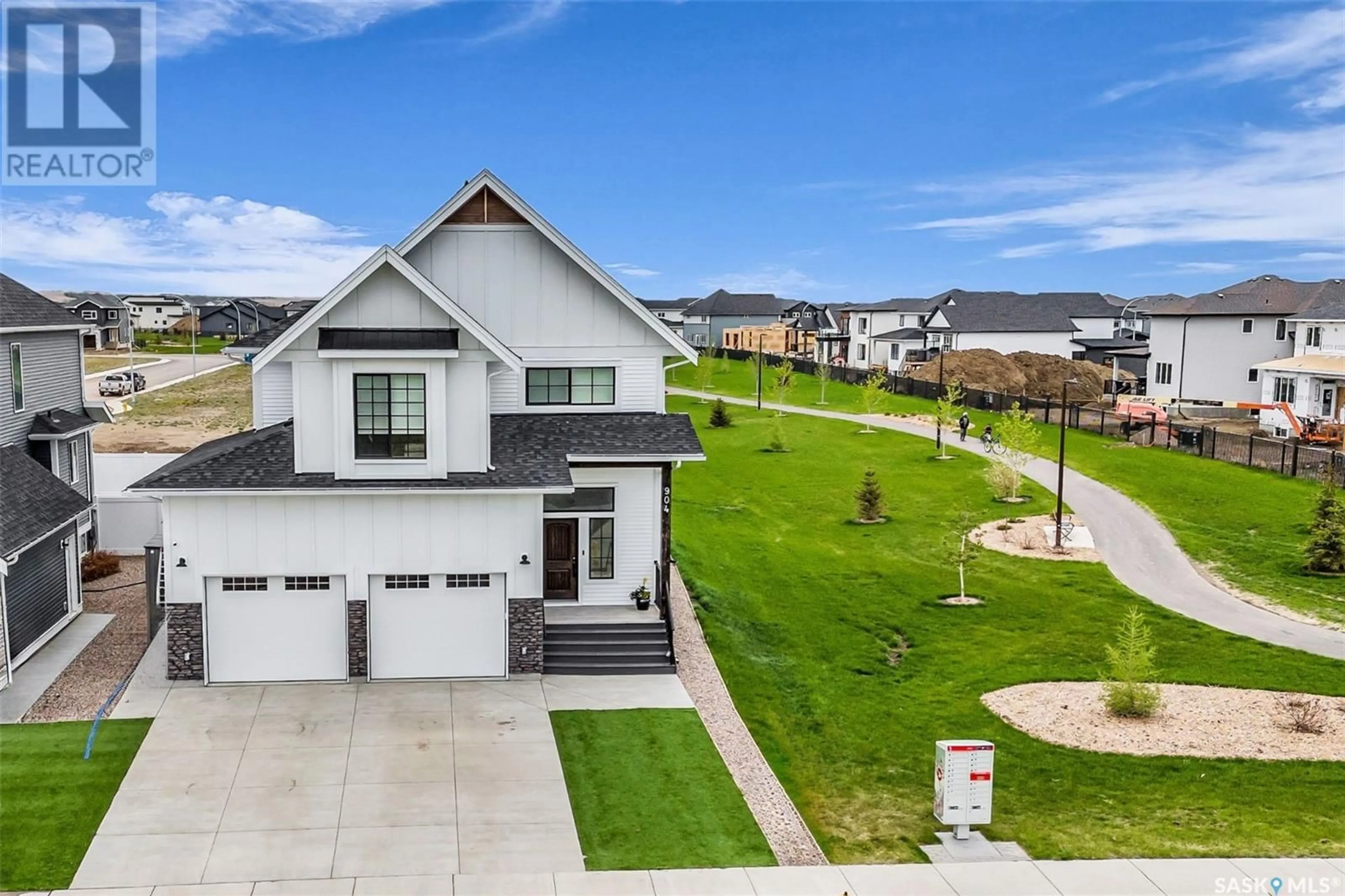 A pic from outside/outdoor area/front of a property/back of a property/a pic from drone, unknown for 904 FEHEREGYHAZI BOULEVARD, Saskatoon Saskatchewan S7W1E1