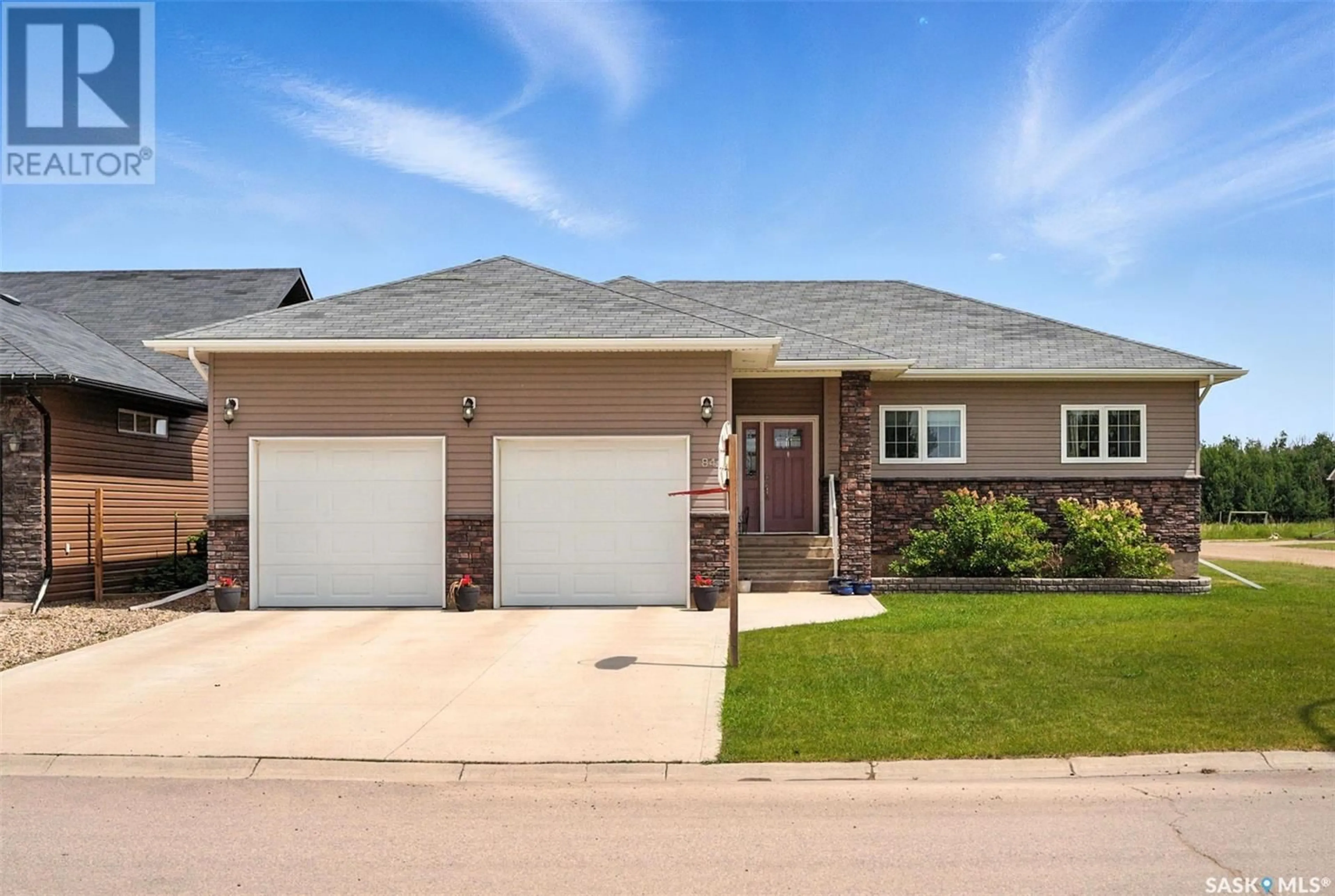 Home with brick exterior material, street for 84 14TH STREET, Humboldt Saskatchewan S0K2A0