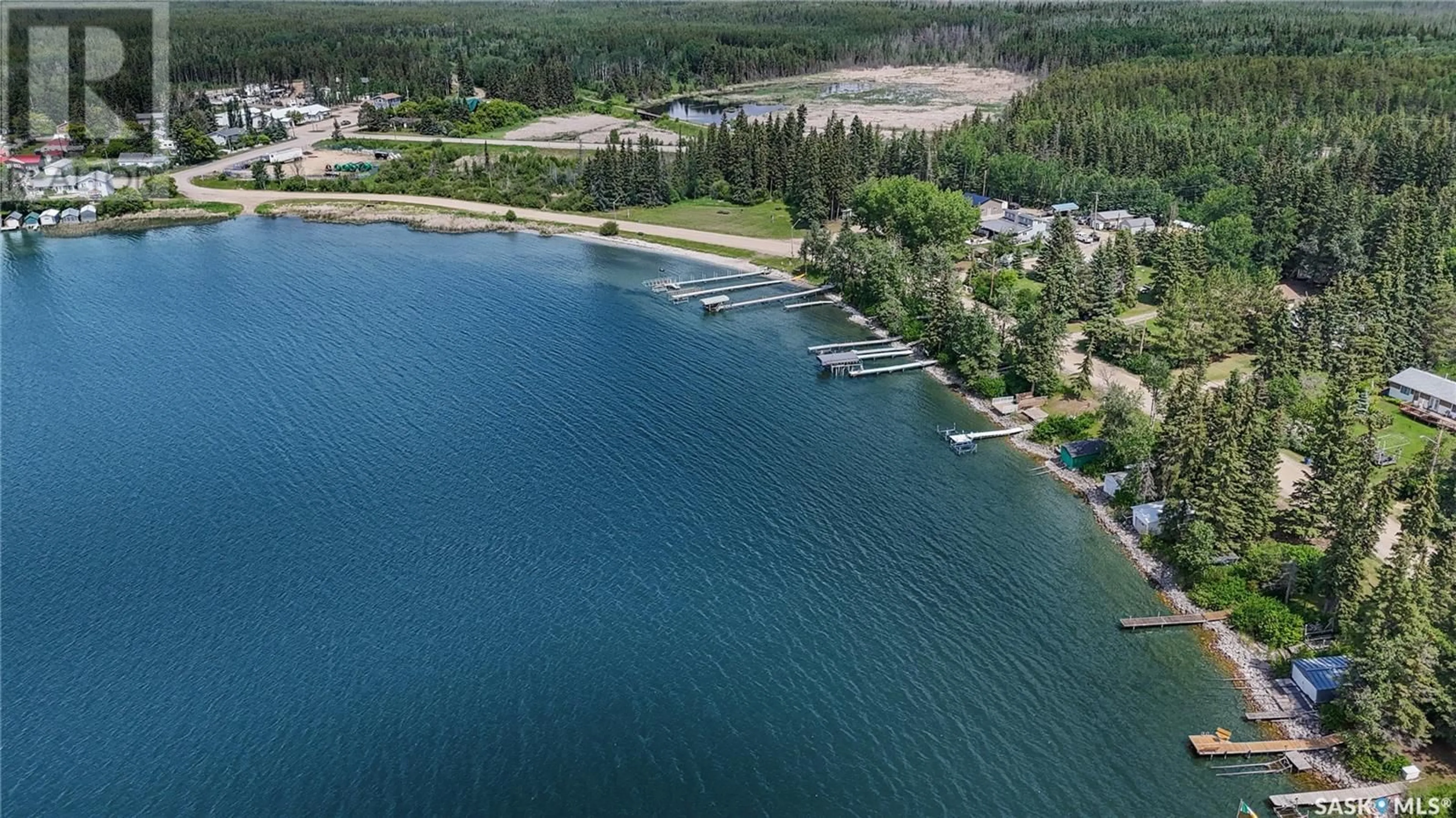 A pic from outside/outdoor area/front of a property/back of a property/a pic from drone, water/lake/river/ocean view for 720 RAILWAY STREET, Chitek Lake Saskatchewan S0J0L0