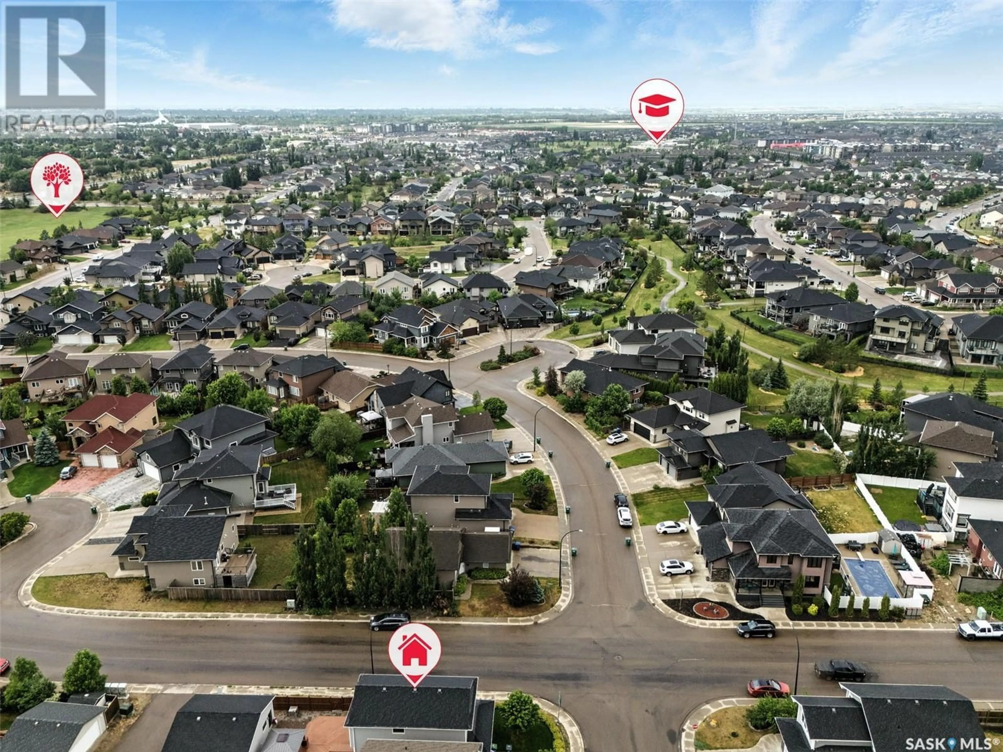 A pic from outside/outdoor area/front of a property/back of a property/a pic from drone, street for 826 PADGET CRESCENT, Saskatoon Saskatchewan S7W0H3