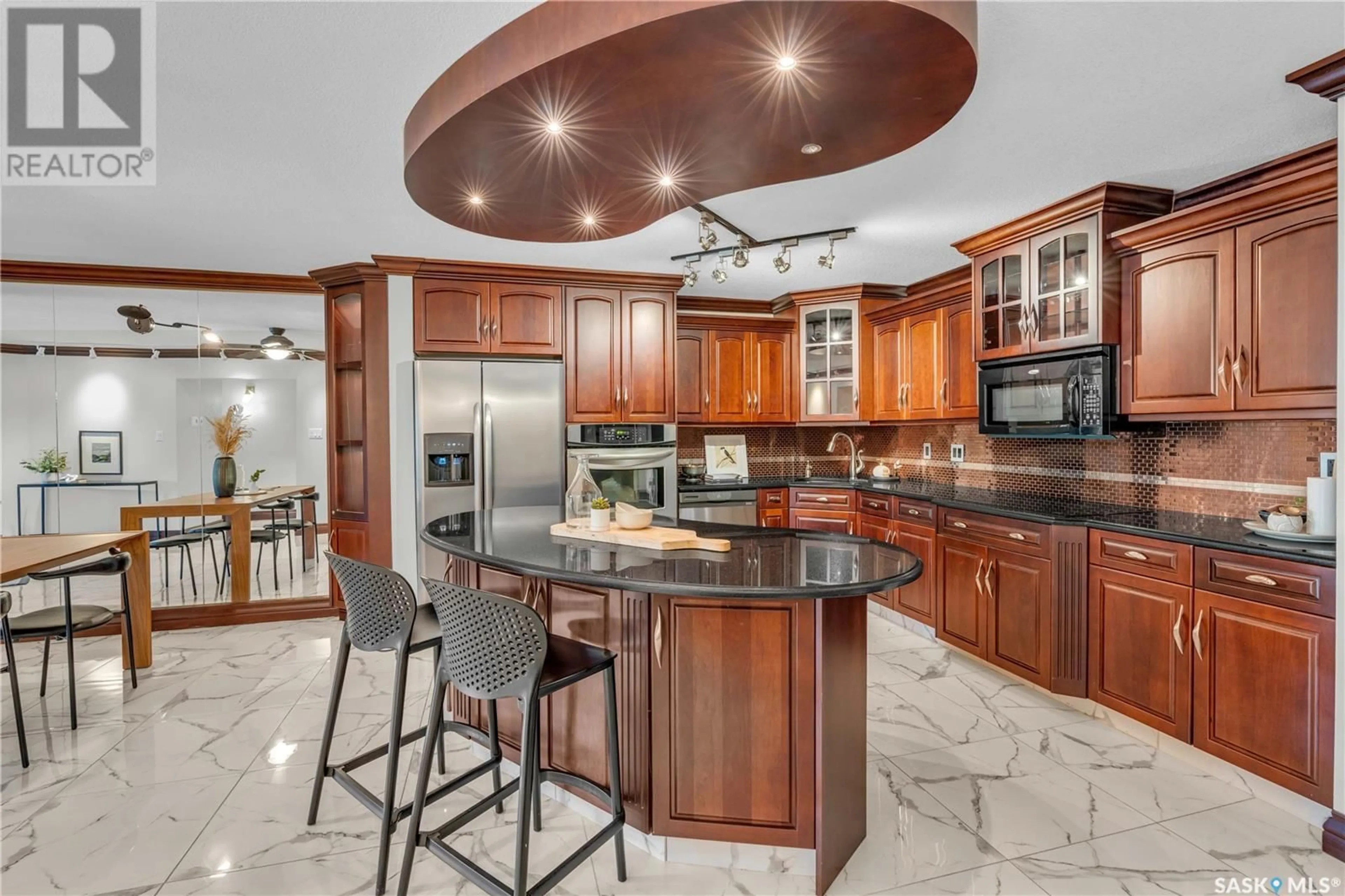 Open concept kitchen, ceramic/tile floor for E - 206 222 SASKATCHEWAN CRESCENT, Saskatoon Saskatchewan S7N0K6