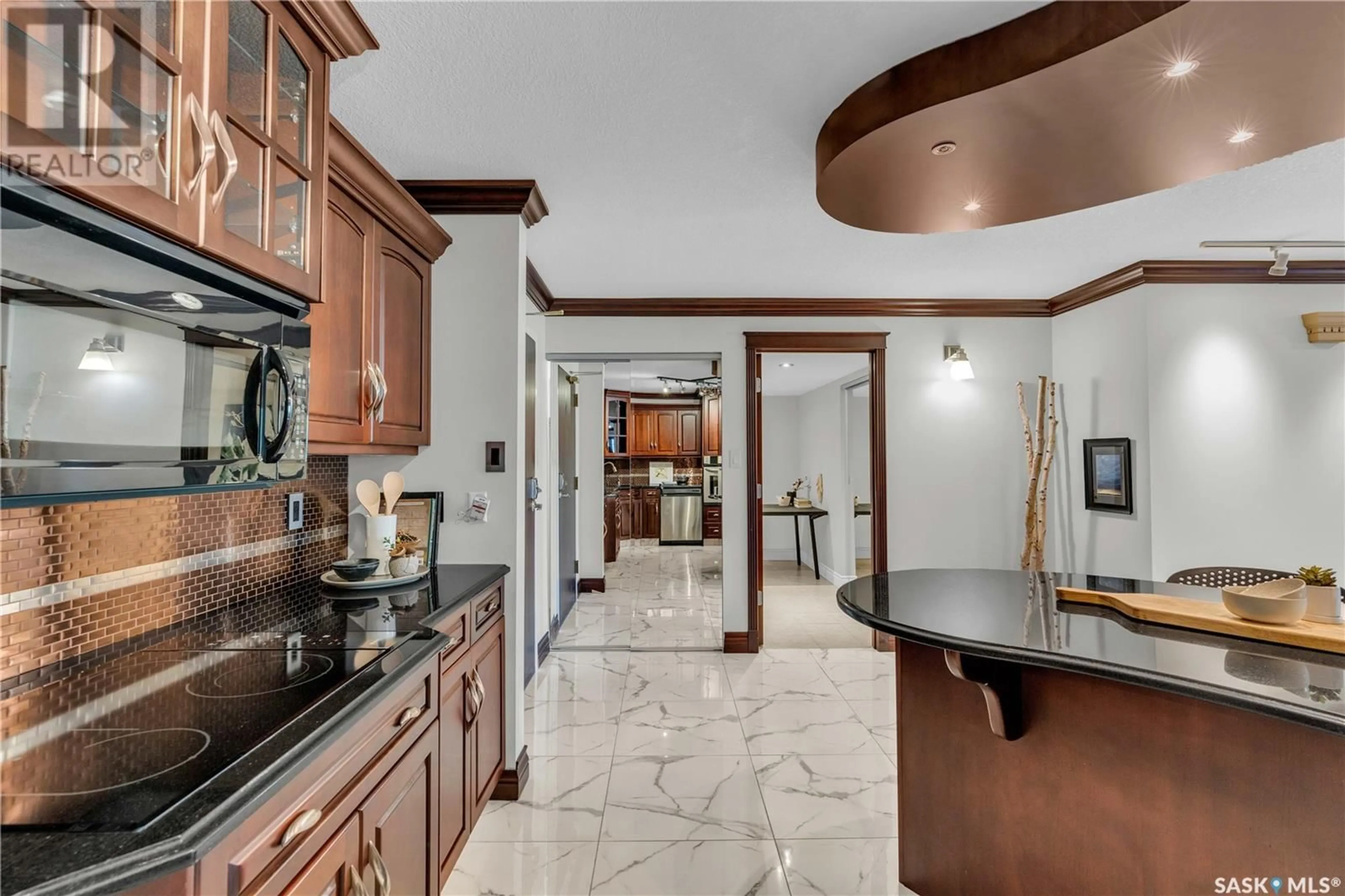 Open concept kitchen, ceramic/tile floor for E - 206 222 SASKATCHEWAN CRESCENT, Saskatoon Saskatchewan S7N0K6