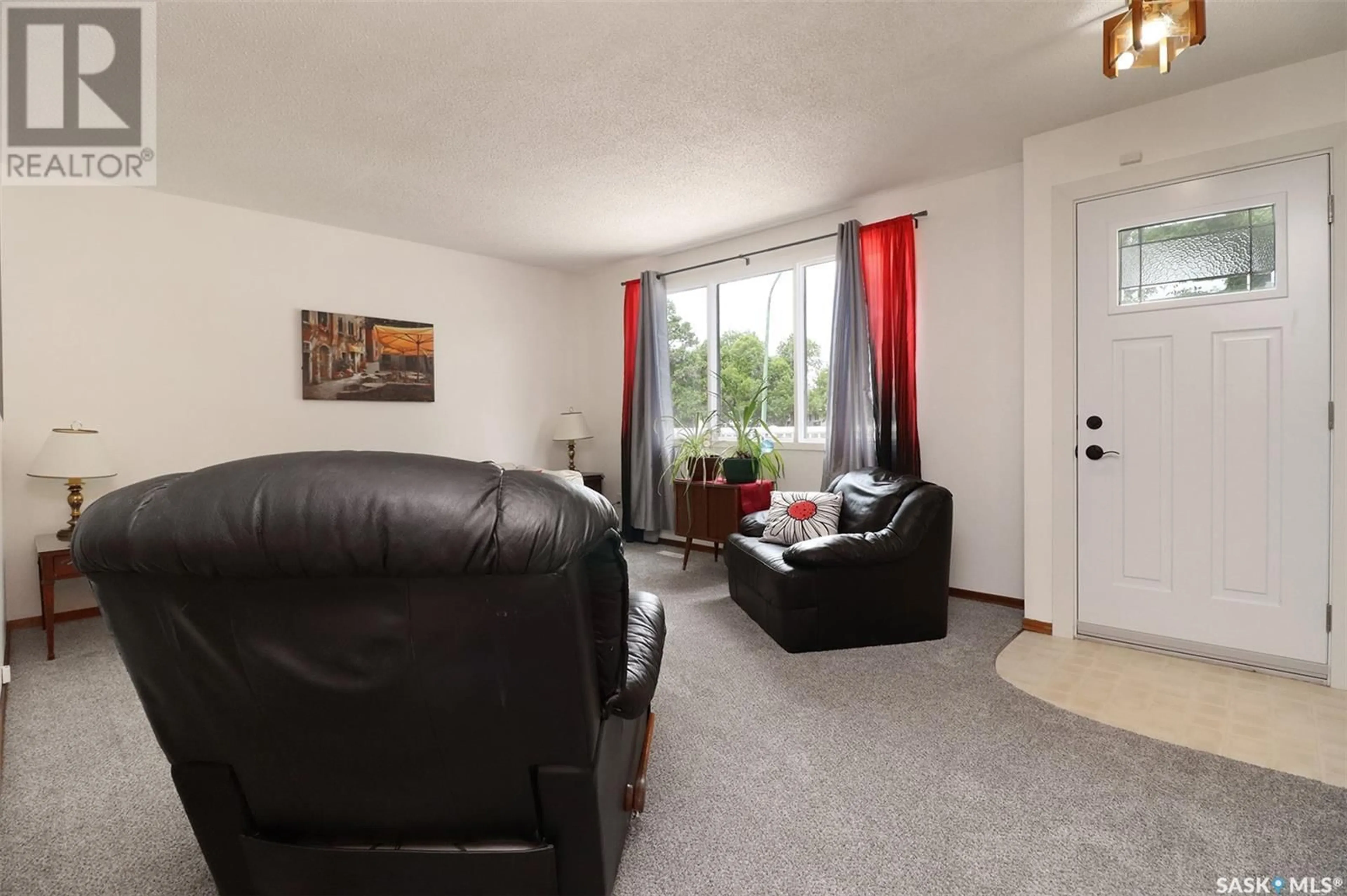 Living room with furniture, unknown for 62 TRUDELLE CRESCENT, Regina Saskatchewan S4T6T3
