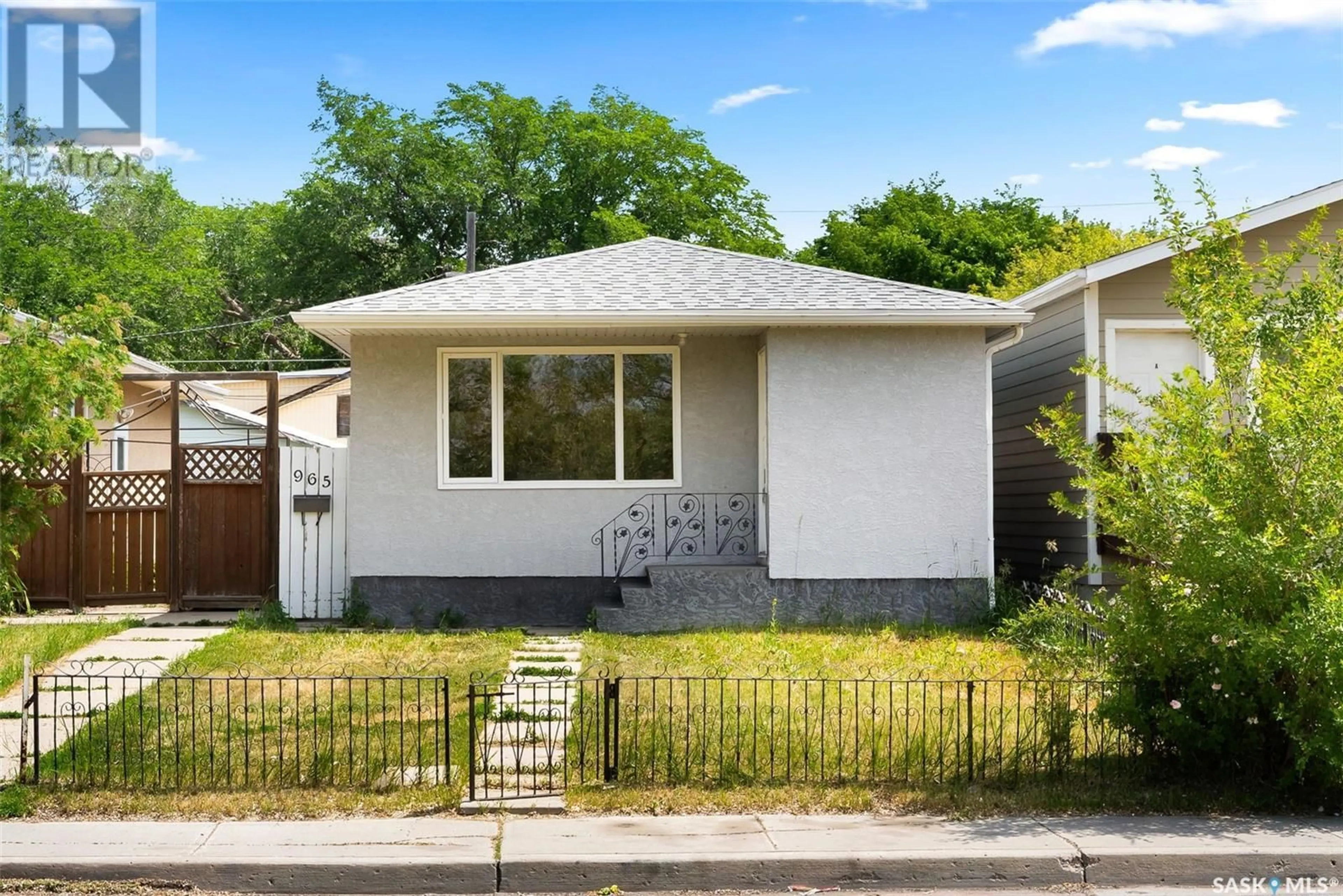 Home with vinyl exterior material, street for 965 CAMERON STREET, Regina Saskatchewan S4T2S5