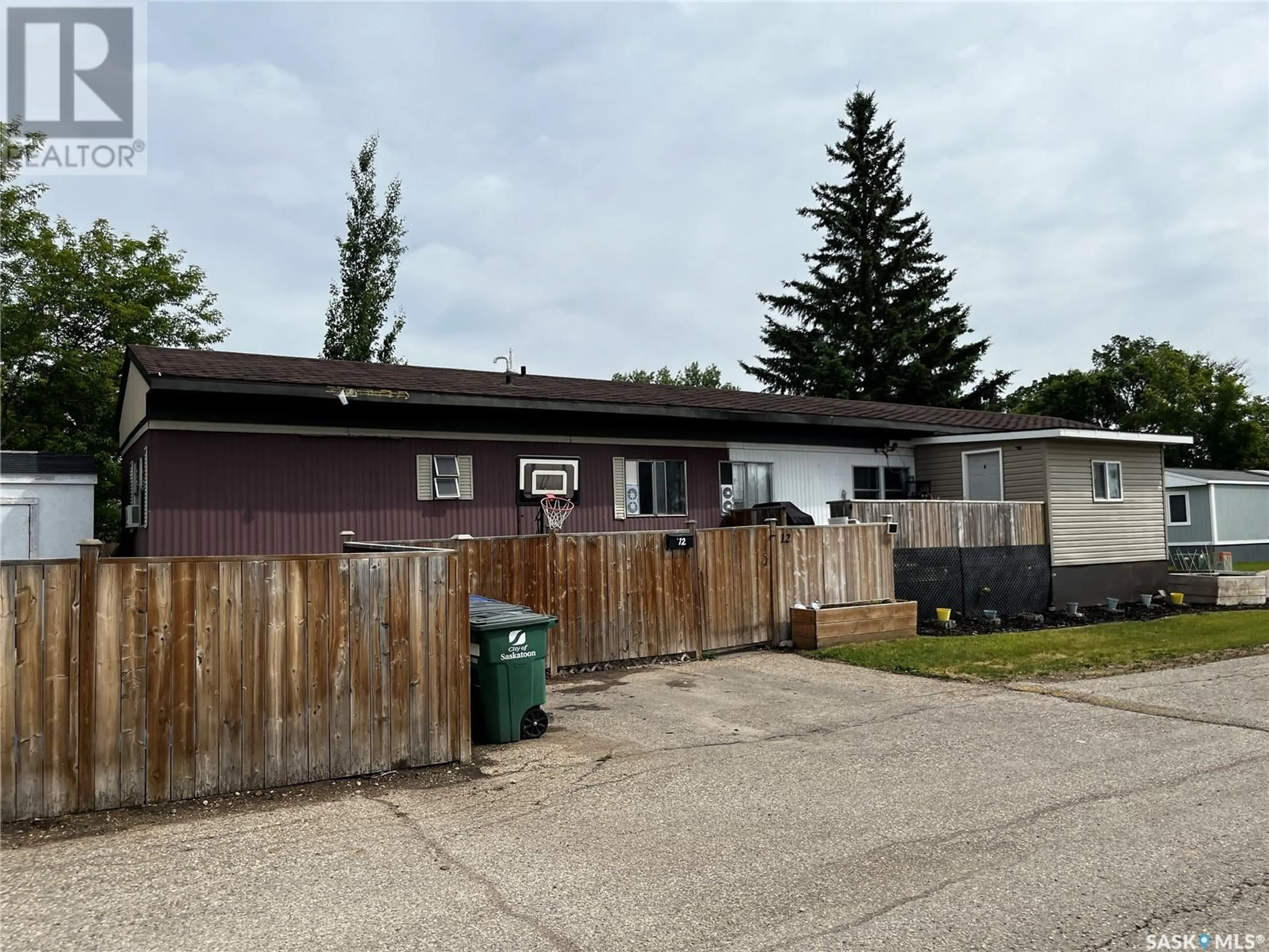 A pic from outside/outdoor area/front of a property/back of a property/a pic from drone, street for 12 - 1035 BOYCHUK DRIVE, Saskatoon Saskatchewan S7H5B2