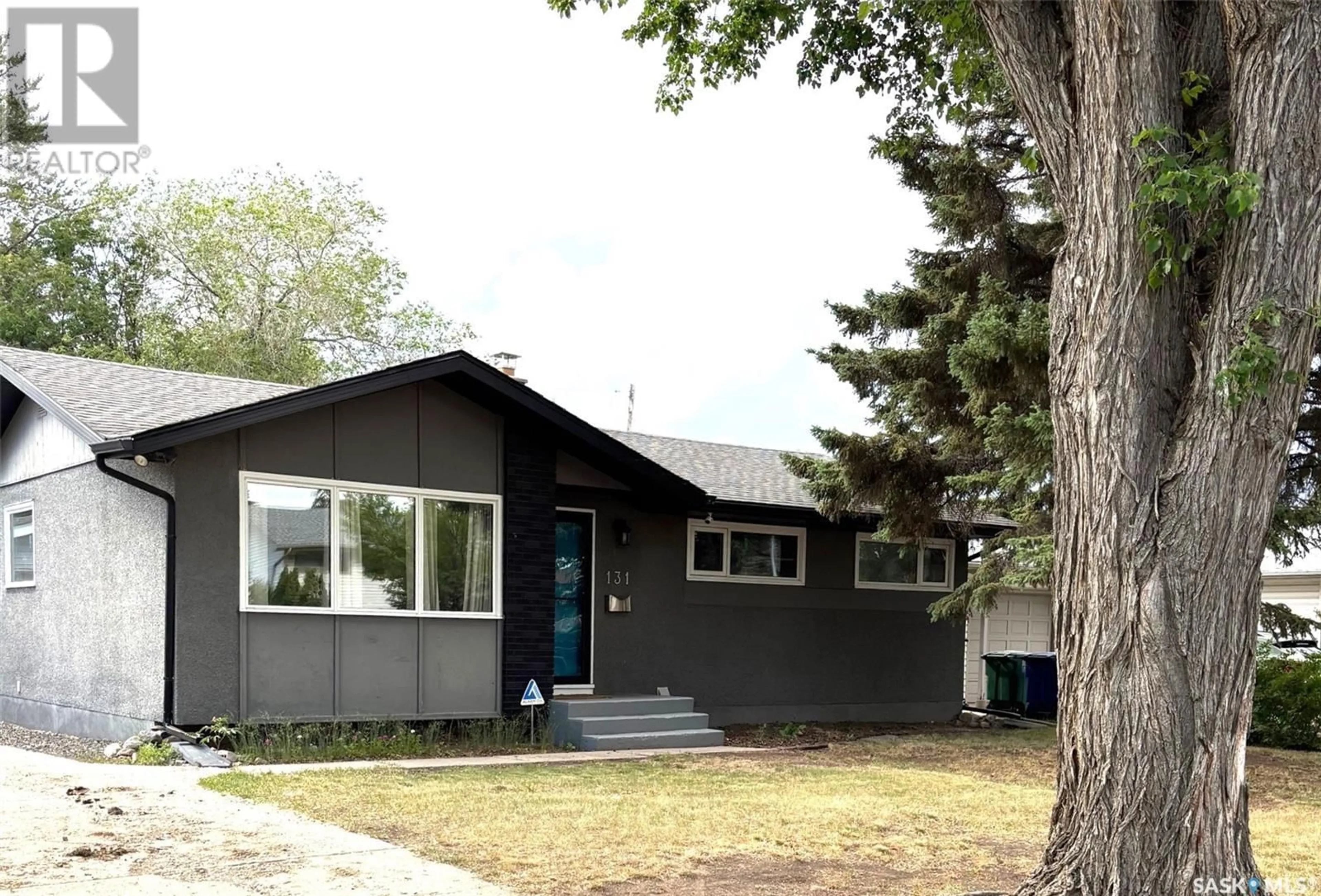 Home with vinyl exterior material, street for 131 O'NEIL CRESCENT, Saskatoon Saskatchewan S7N1W9