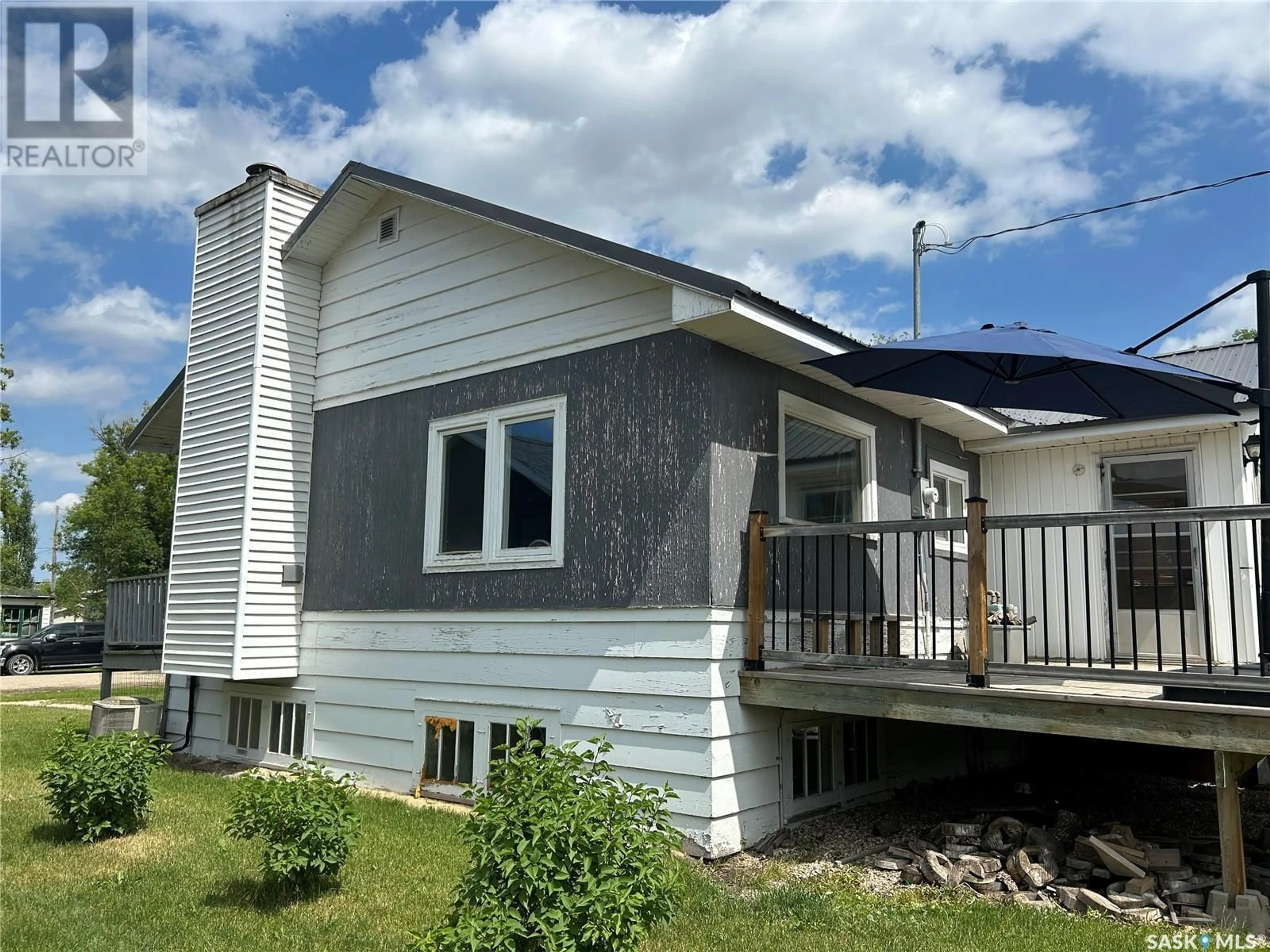 Home with vinyl exterior material, building for E - 106 3RD AVENUE, Nokomis Saskatchewan S0G3R0
