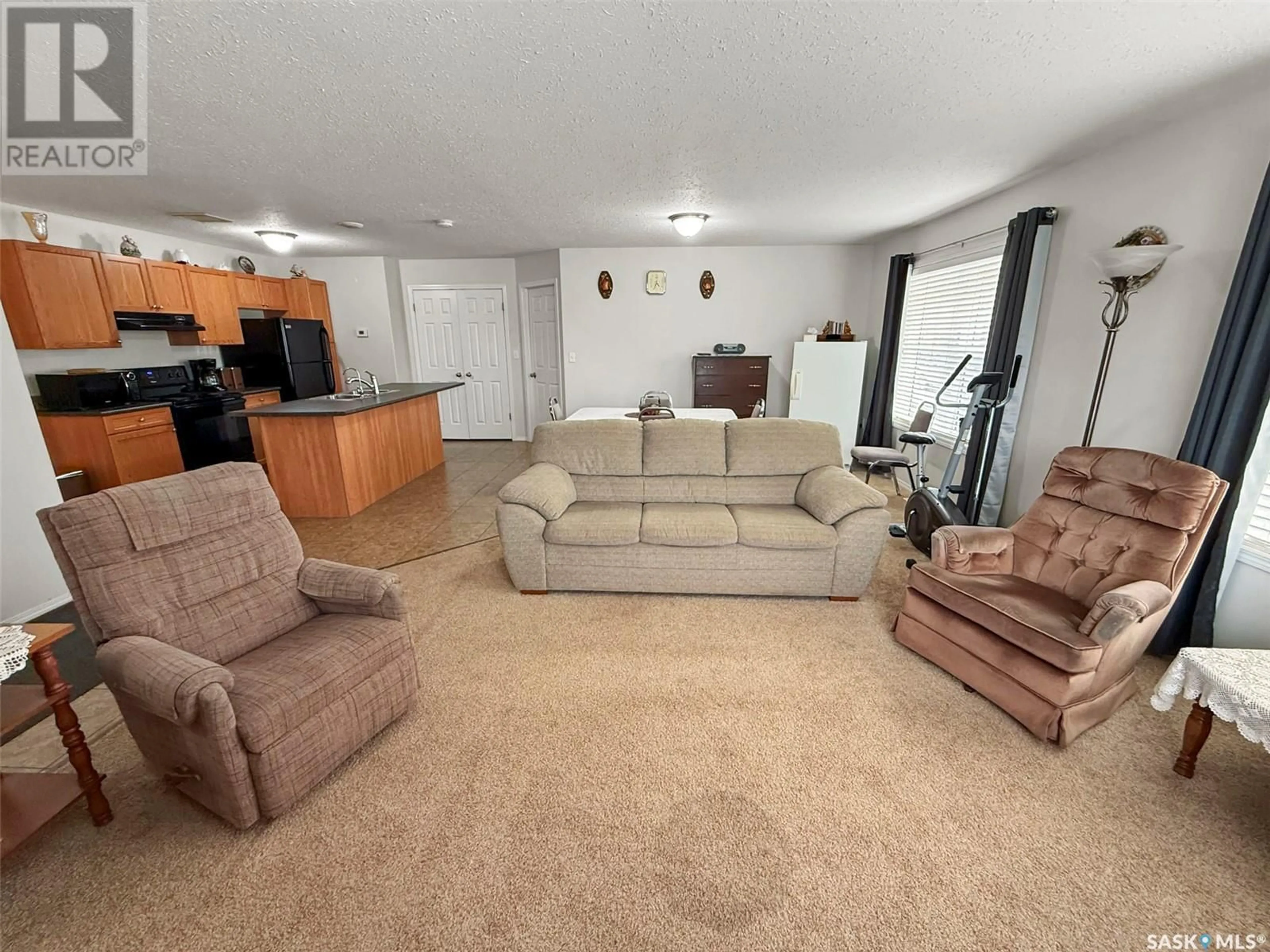 Living room with furniture, unknown for 9 - 1275 SOUTH RAILWAY STREET, Swift Current Saskatchewan S9H5P3