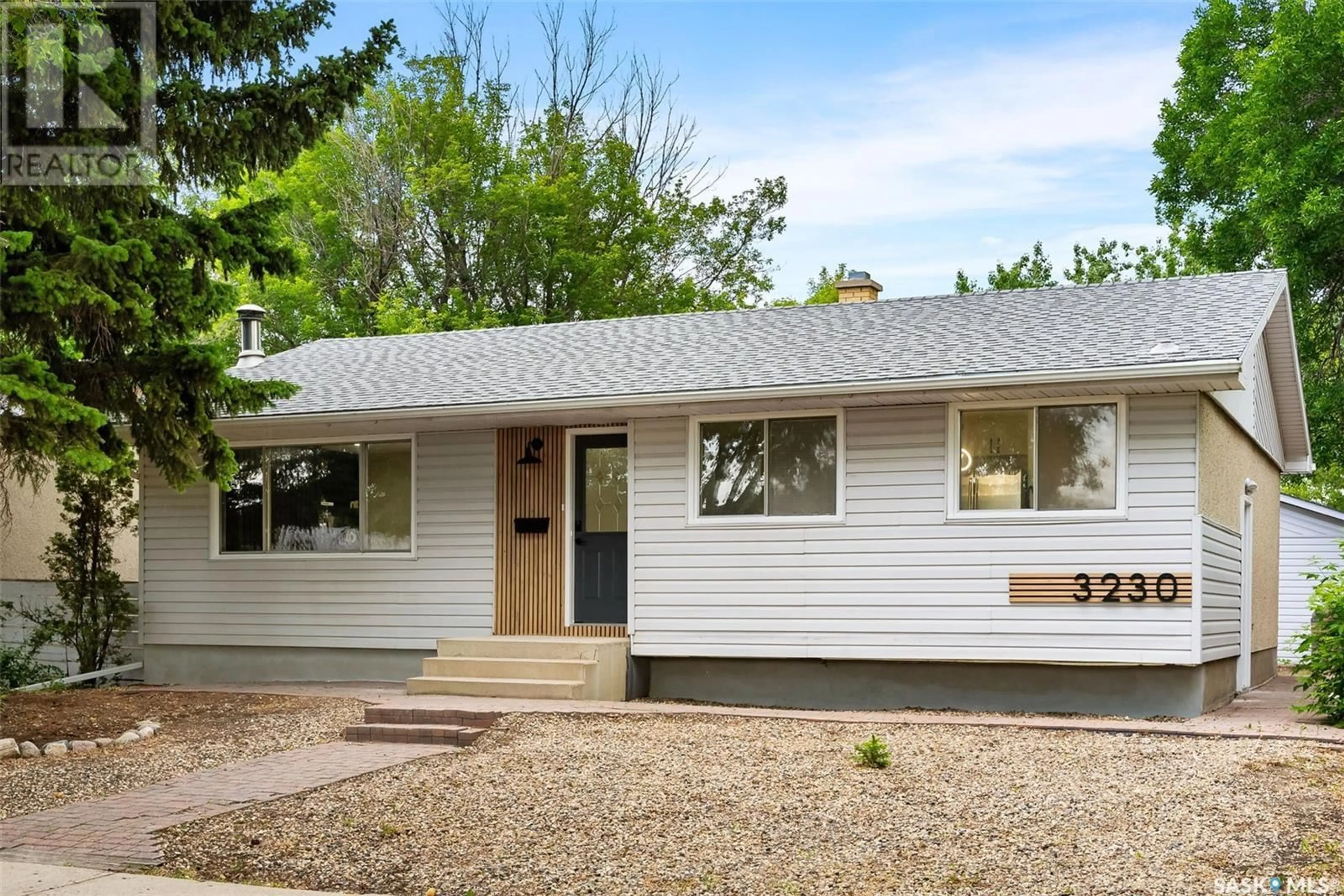 Home with vinyl exterior material, street for 3230 6TH AVENUE, Regina Saskatchewan S4R0P6