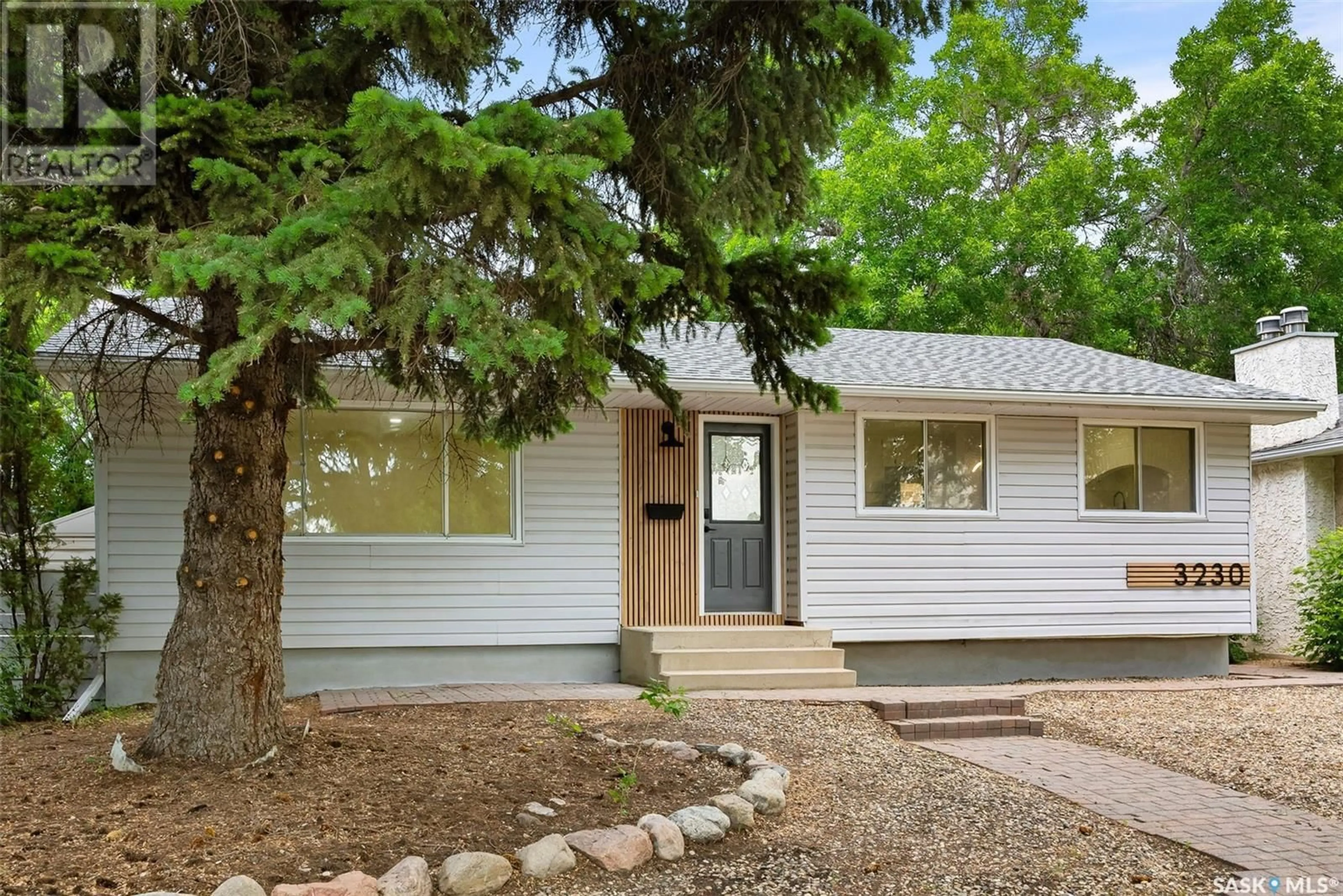 Home with vinyl exterior material, street for 3230 6TH AVENUE, Regina Saskatchewan S4R0P6