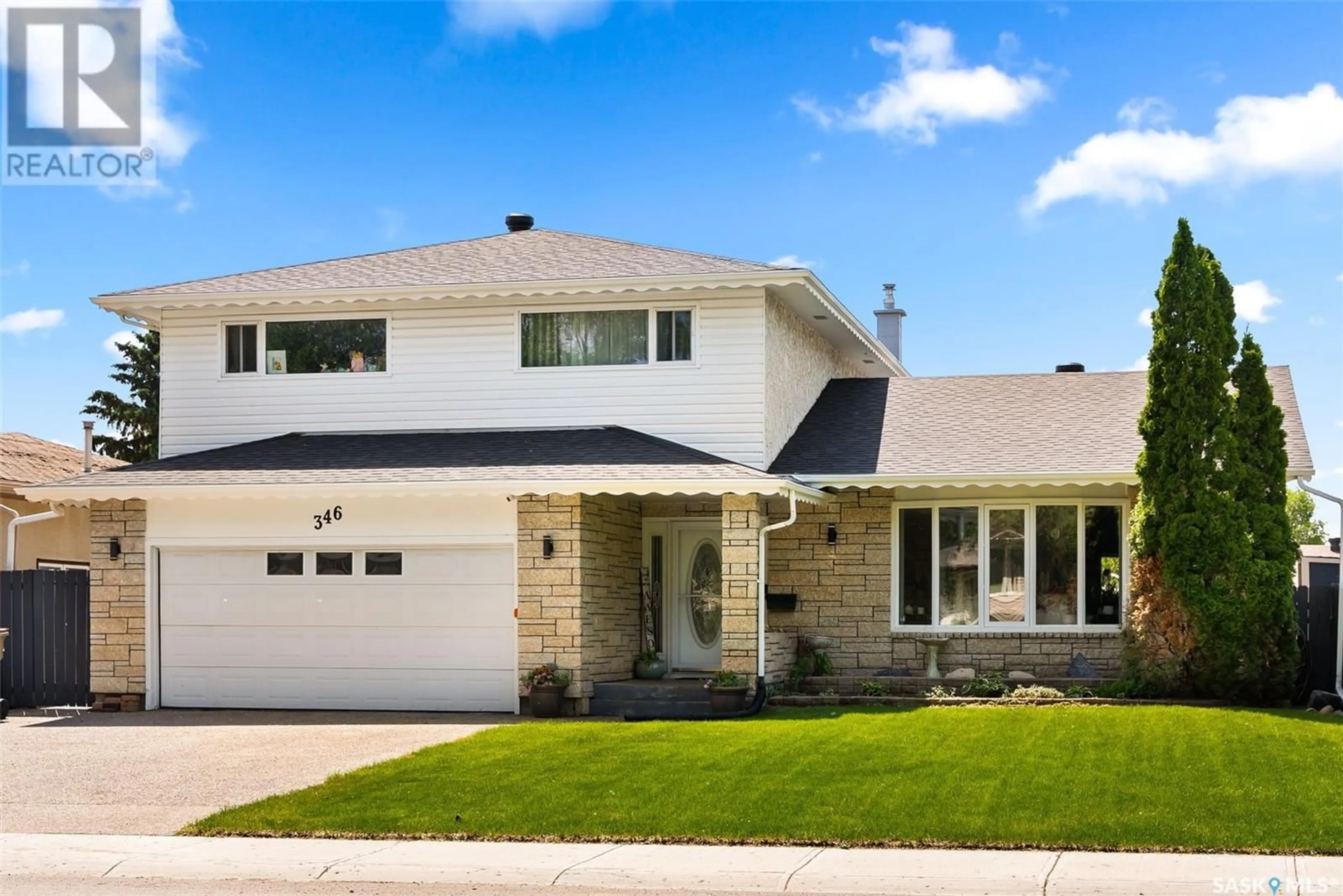 Home with vinyl exterior material, street for 346 DALGLIESH DRIVE, Regina Saskatchewan S4R7J3