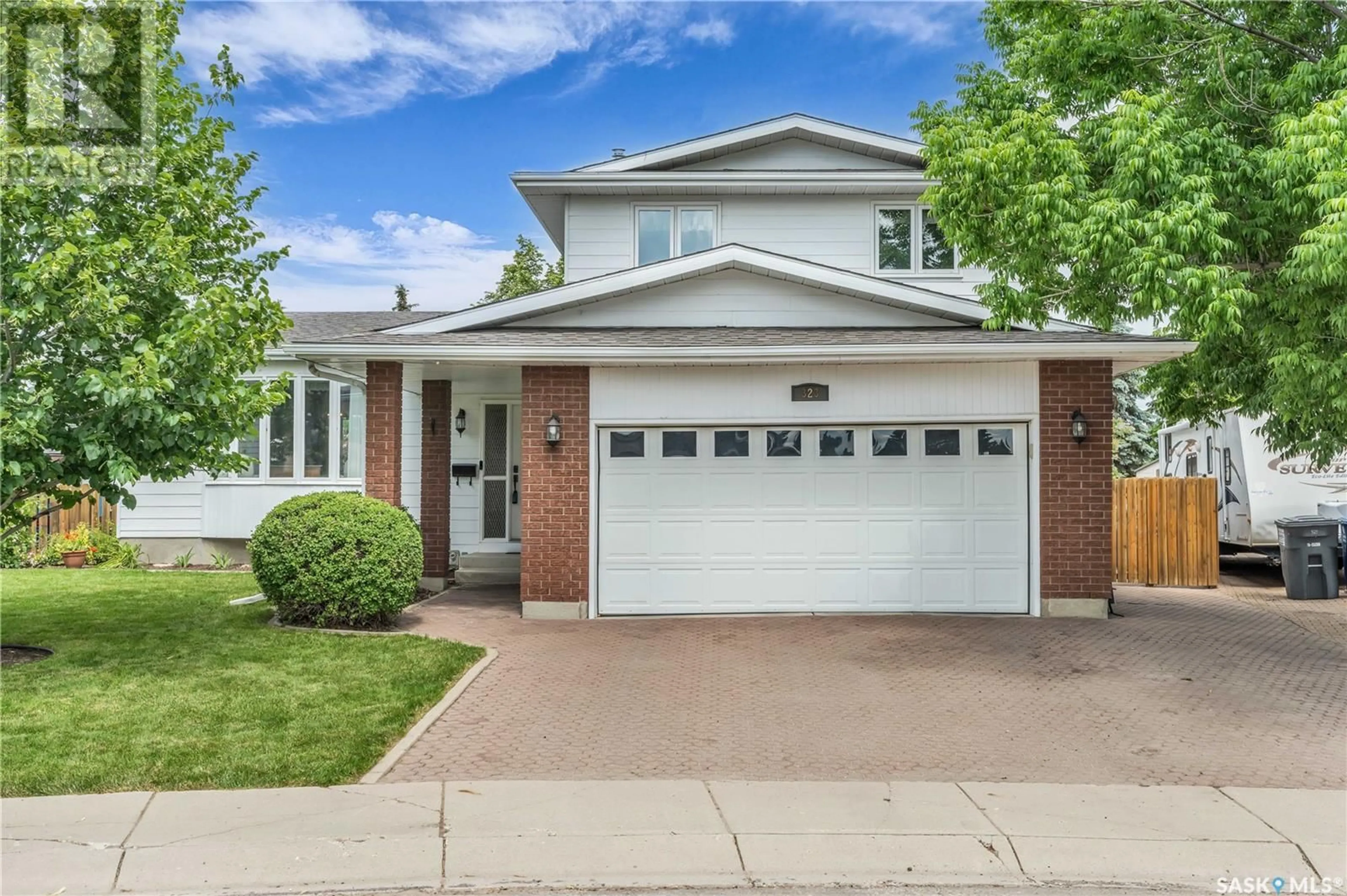 Home with brick exterior material, street for 323 ZEMAN CRESCENT, Saskatoon Saskatchewan S7K7W6
