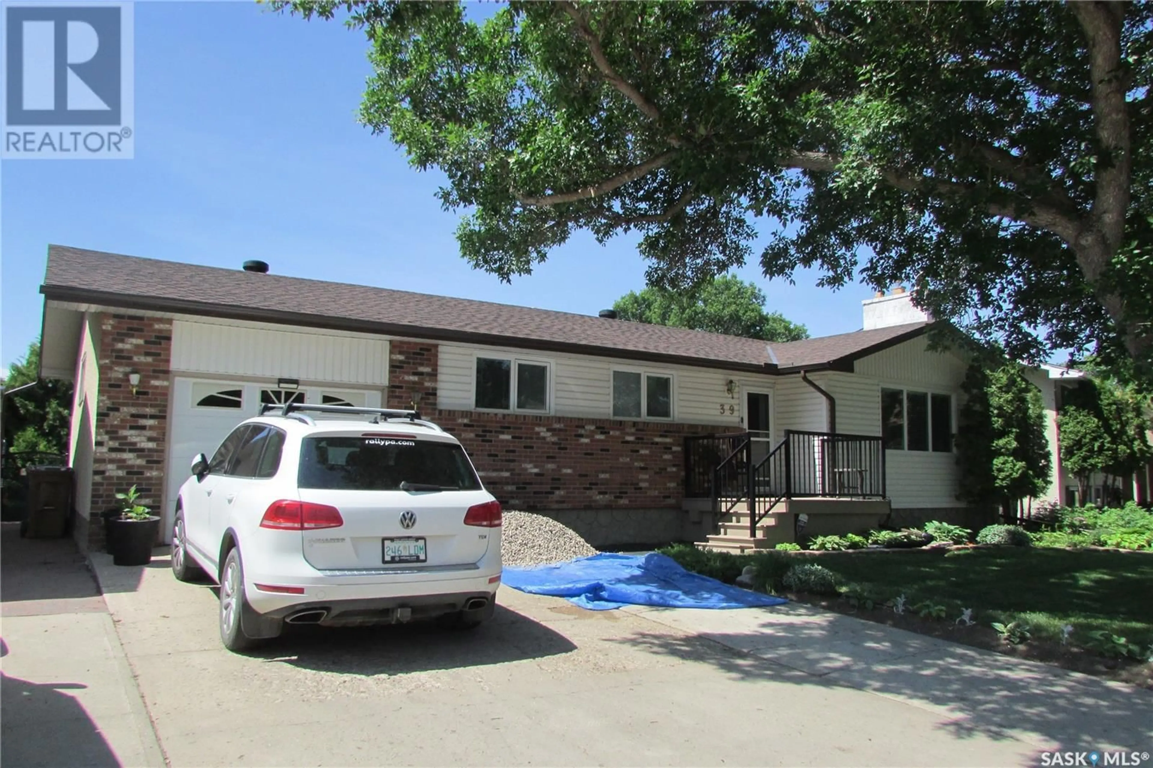 Home with vinyl exterior material, street for 39 NOLLET AVENUE, Regina Saskatchewan S4T7J8