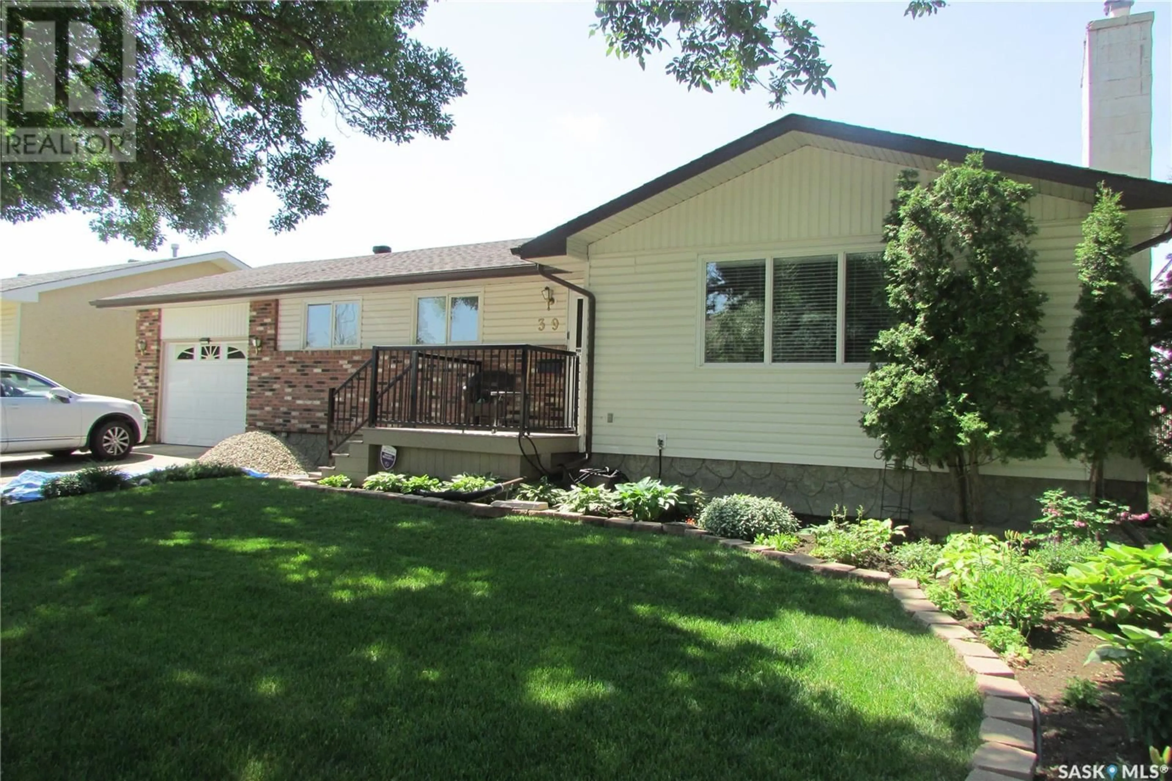Home with vinyl exterior material, street for 39 NOLLET AVENUE, Regina Saskatchewan S4T7J8