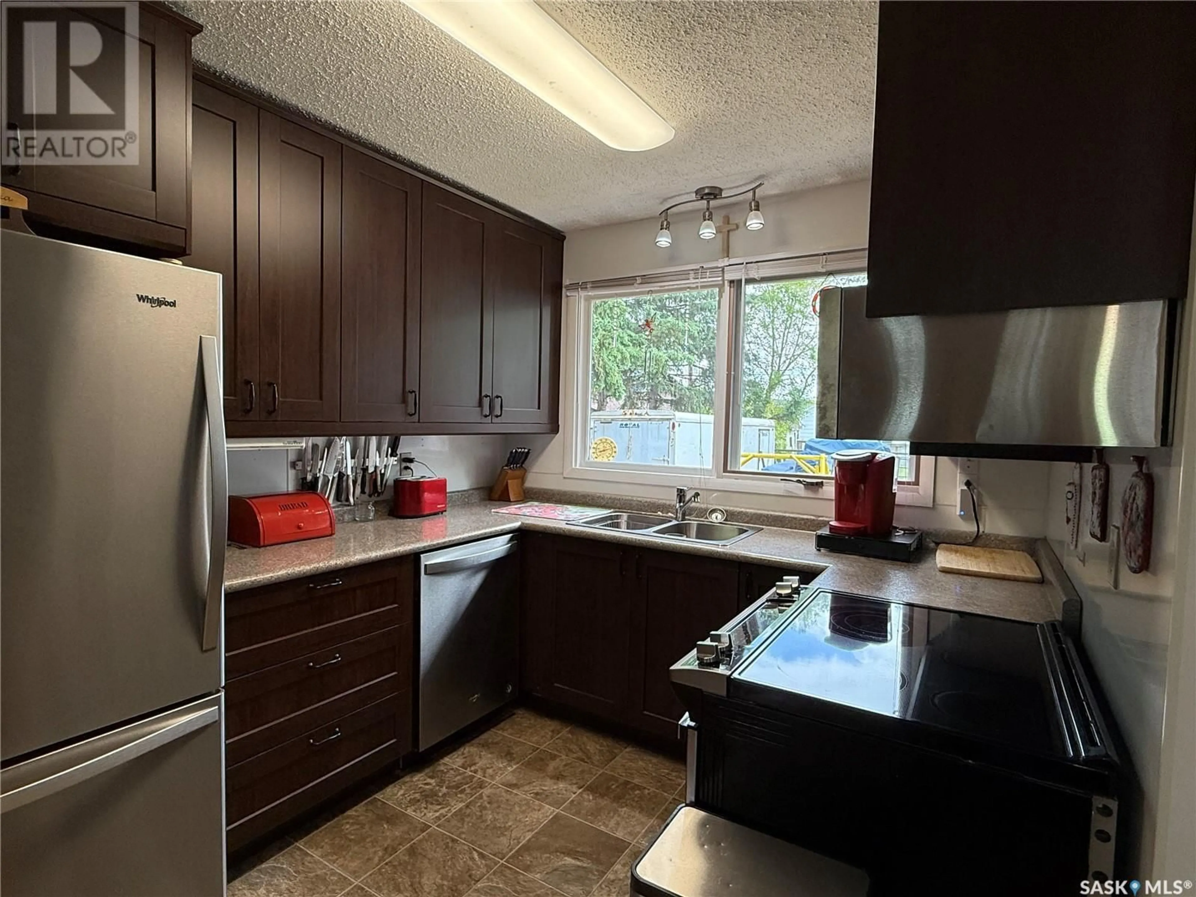 Standard kitchen, wood/laminate floor for 704 1ST AVENUE, Loon Lake Saskatchewan S0M1L0