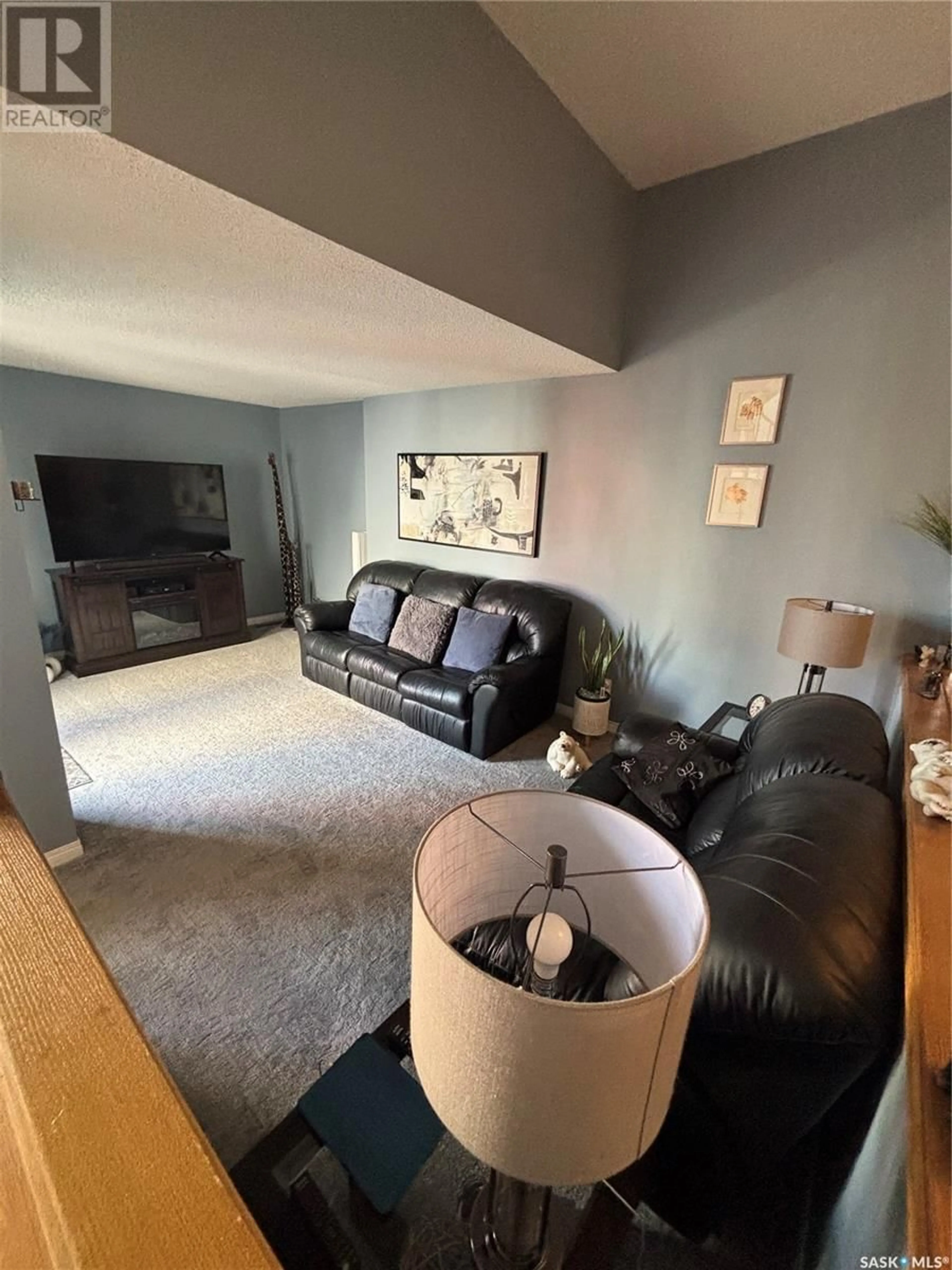 Living room with furniture, unknown for 5044 10TH AVENUE, Regina Saskatchewan S4T7P4
