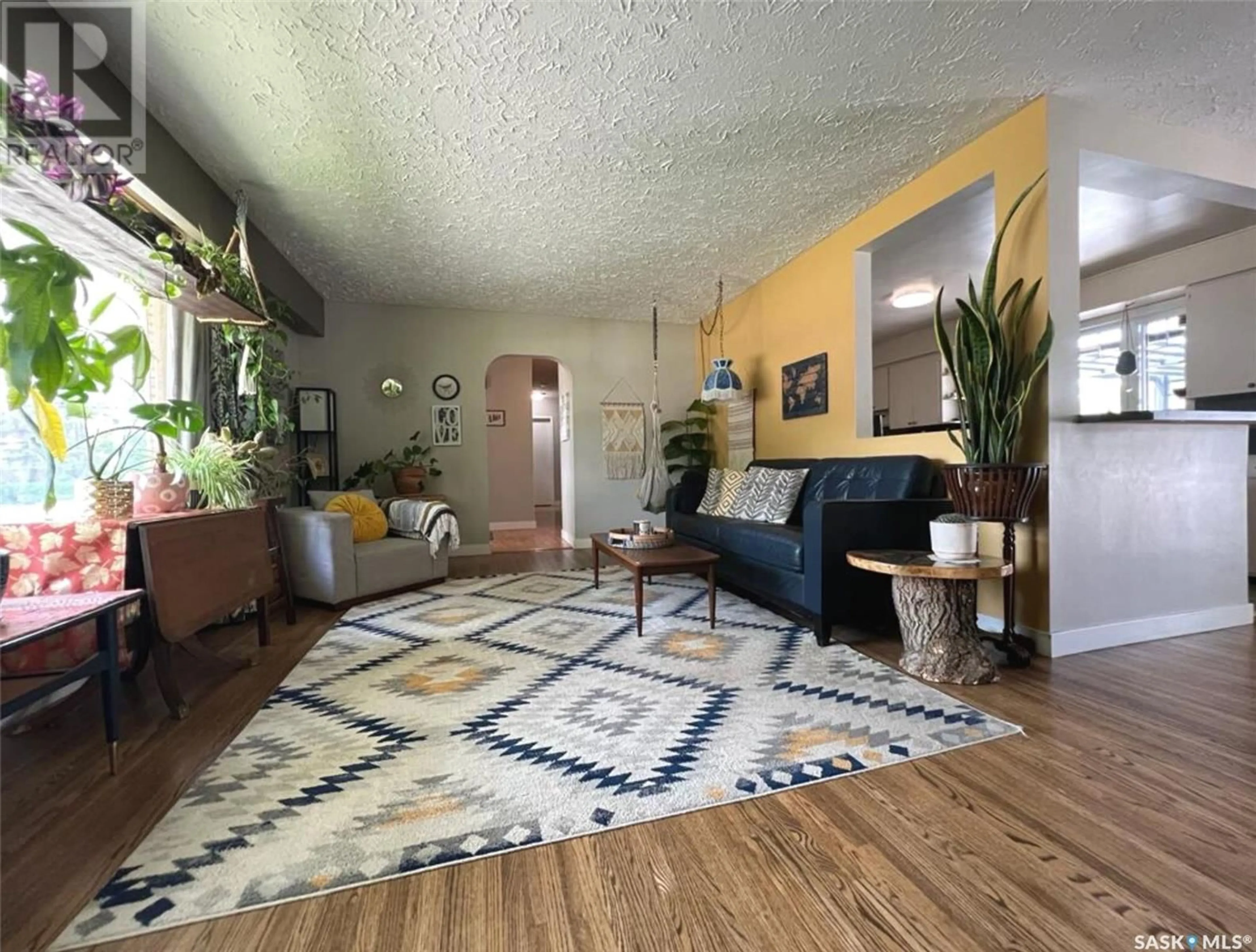 Living room with furniture, carpet floor for 394 3RD AVENUE, Swift Current Saskatchewan S9H3K7